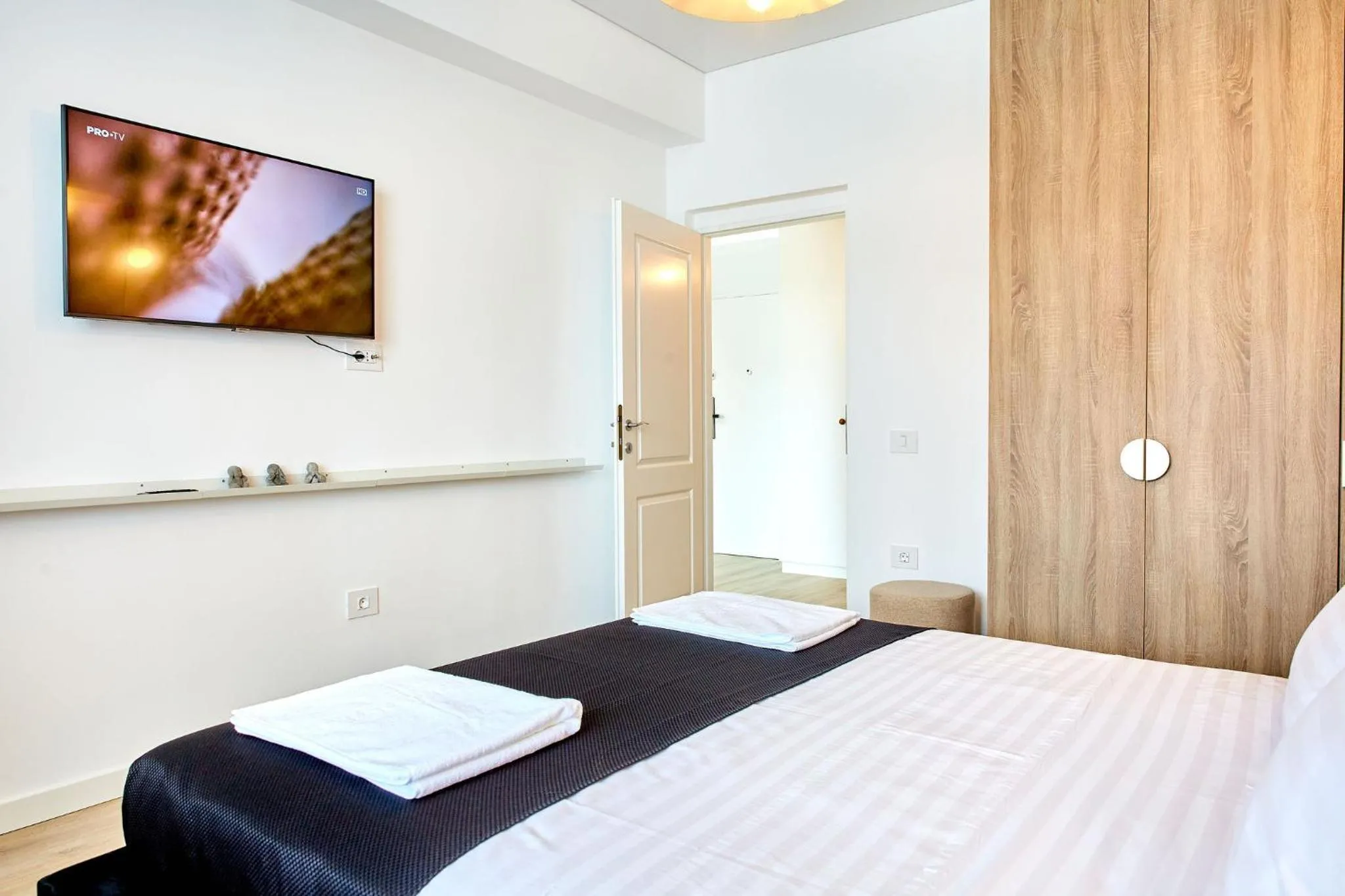 Bed in Apartamente by R S