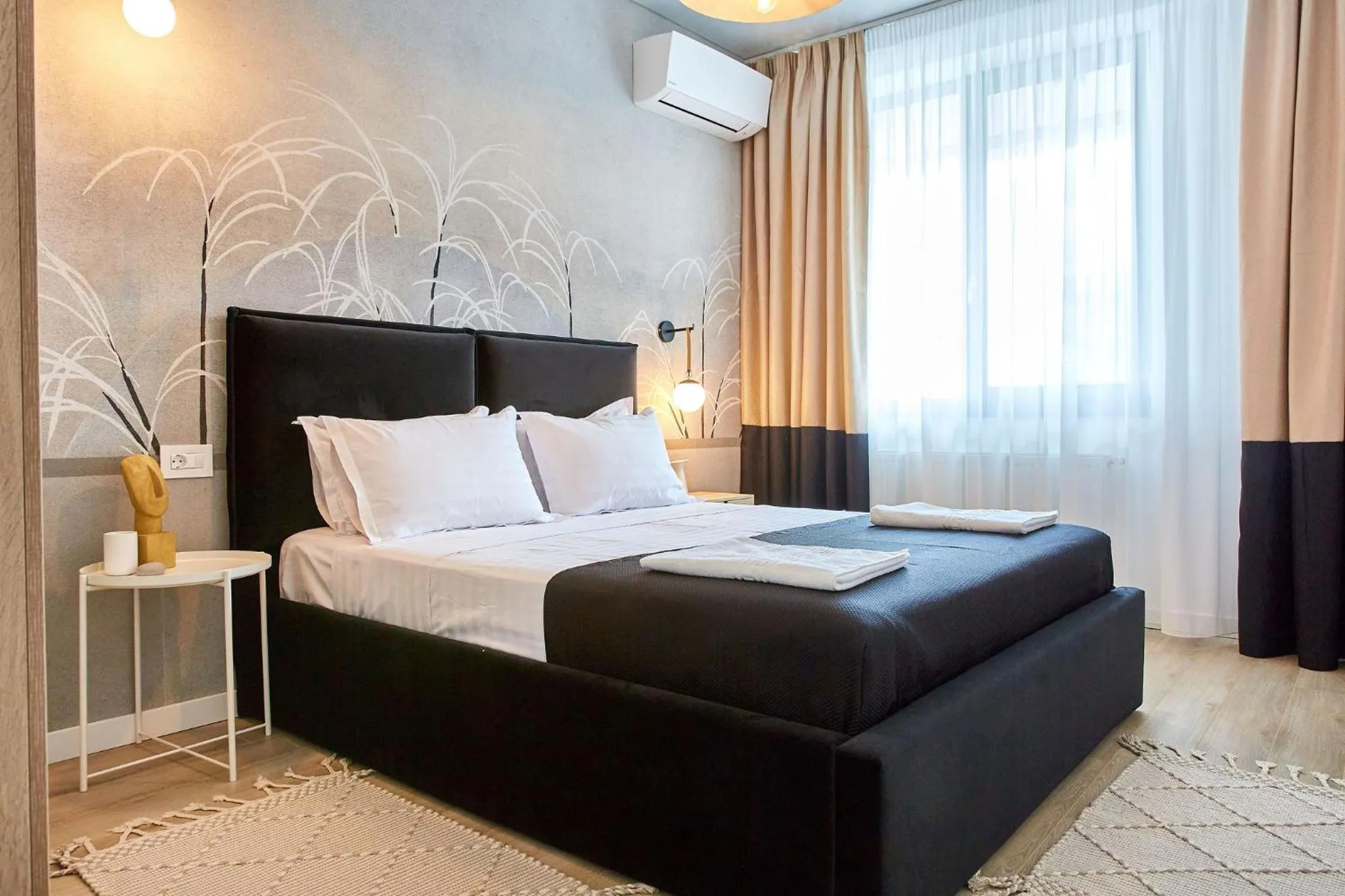 Bed in Apartamente by R S