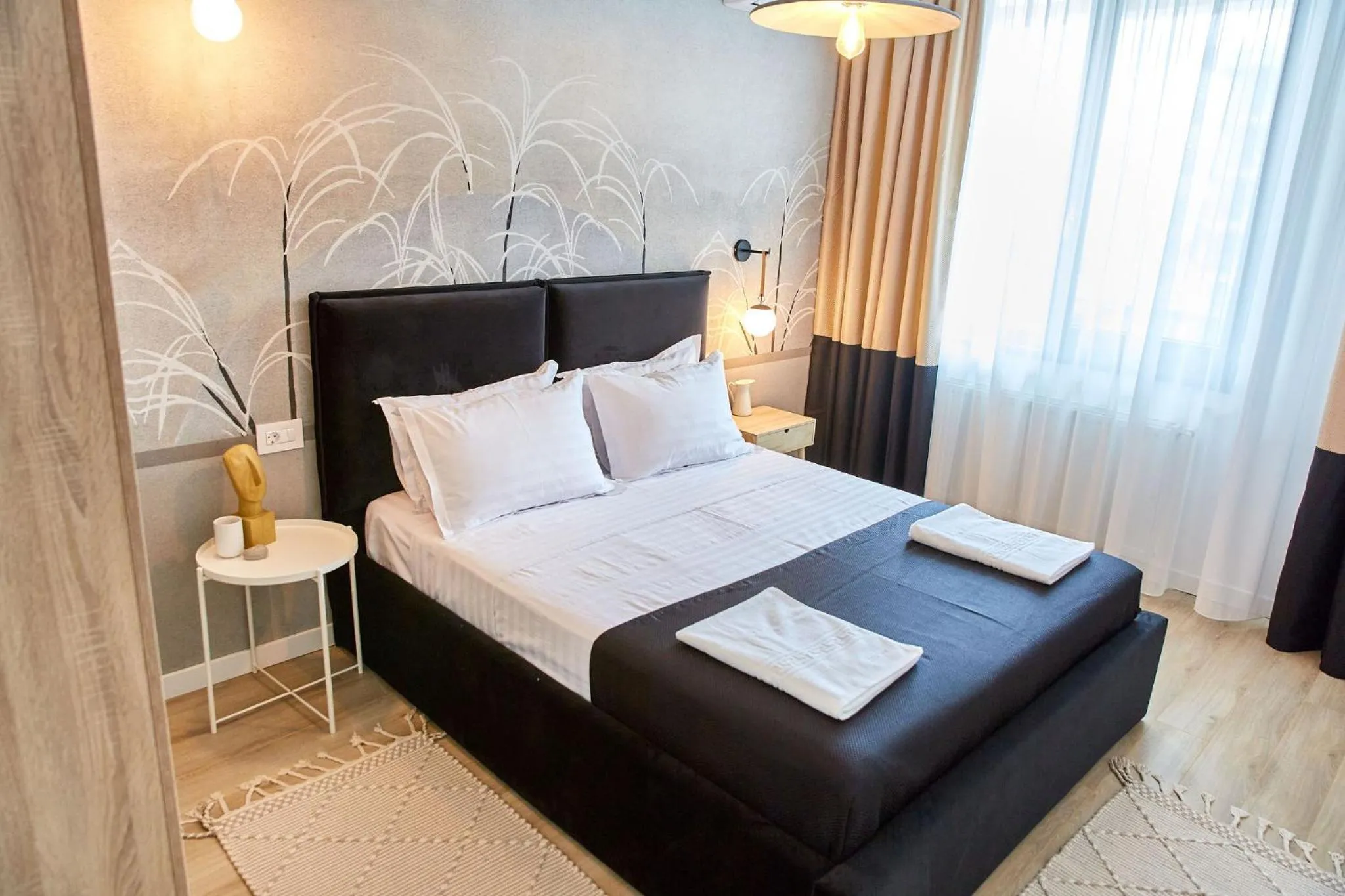 Bed in Apartamente by R S