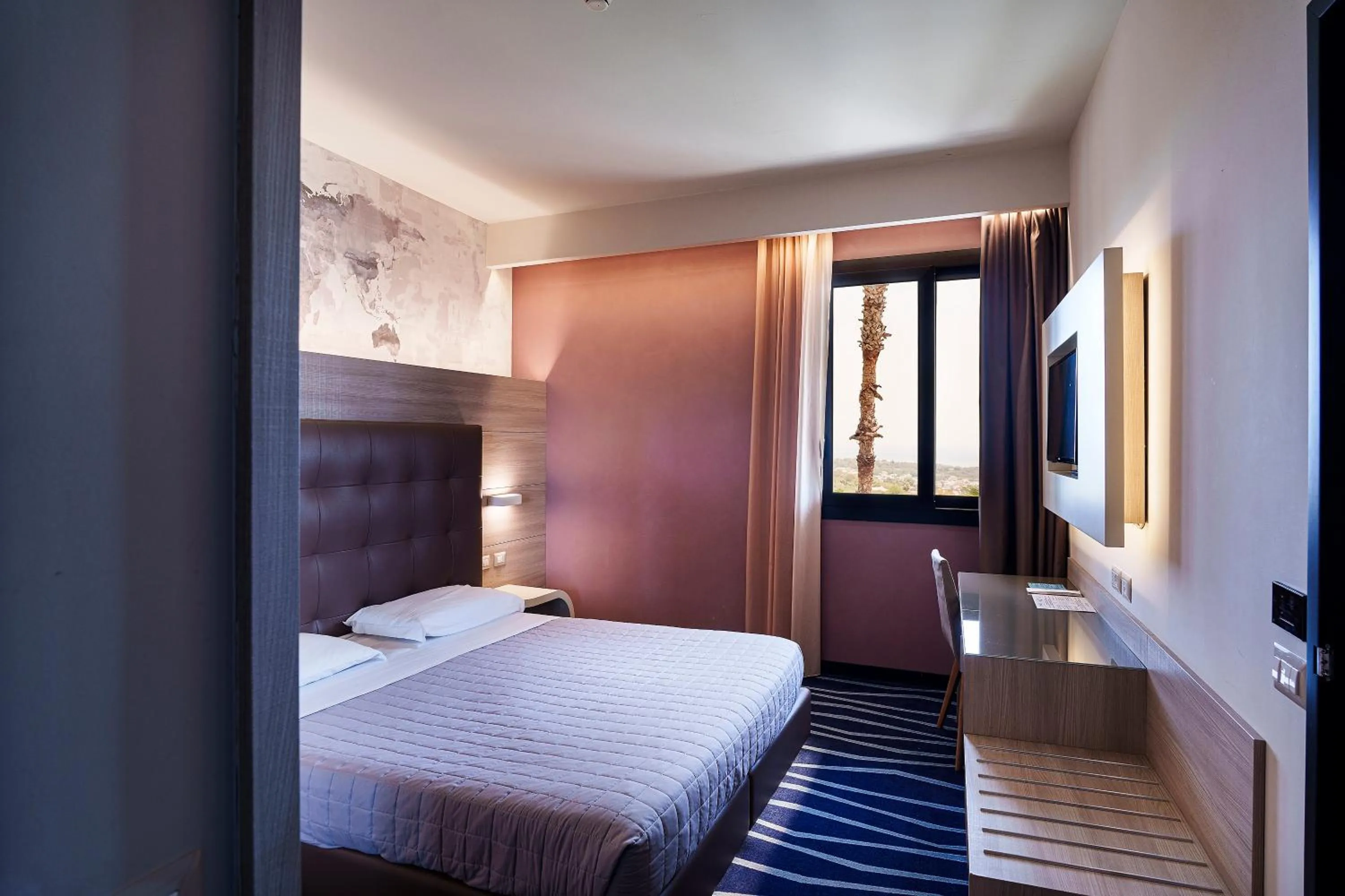 Bed in President Park Hotel