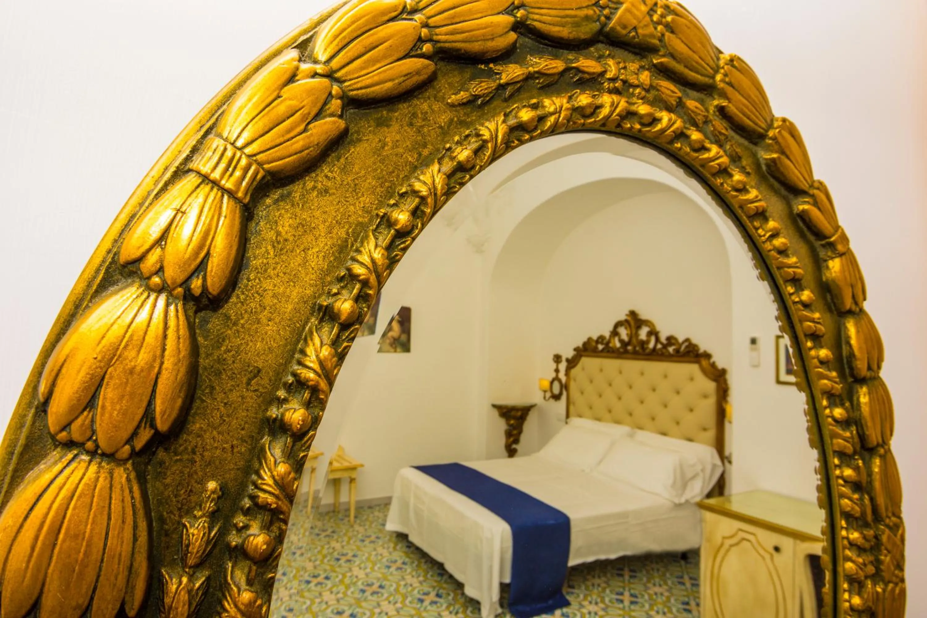 Decorative detail, Bed in Hotel Reginella