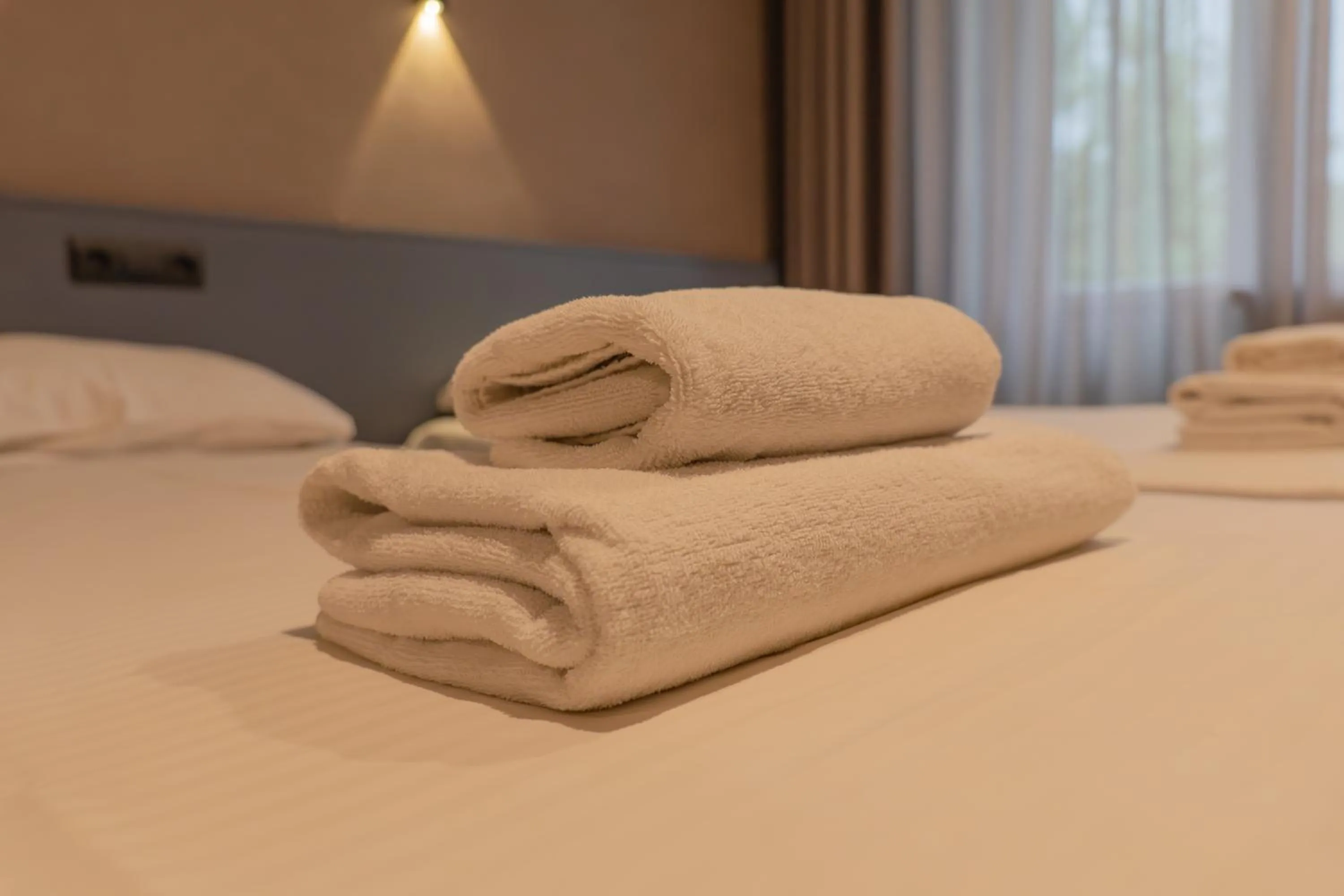 towels, Bed in Olympica Hotel