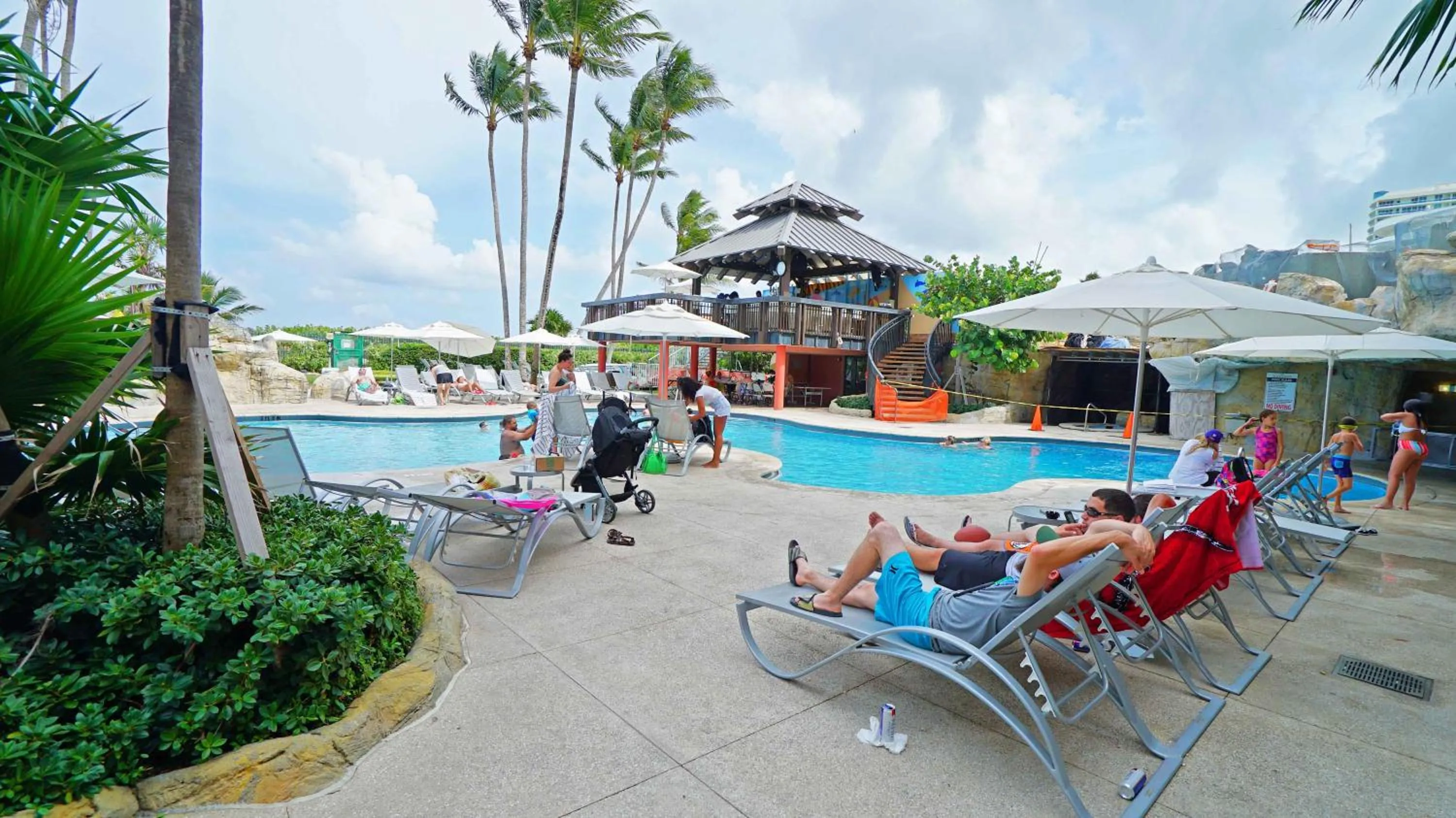 Swimming pool in Deluxe Apartments by South Florida Vacations