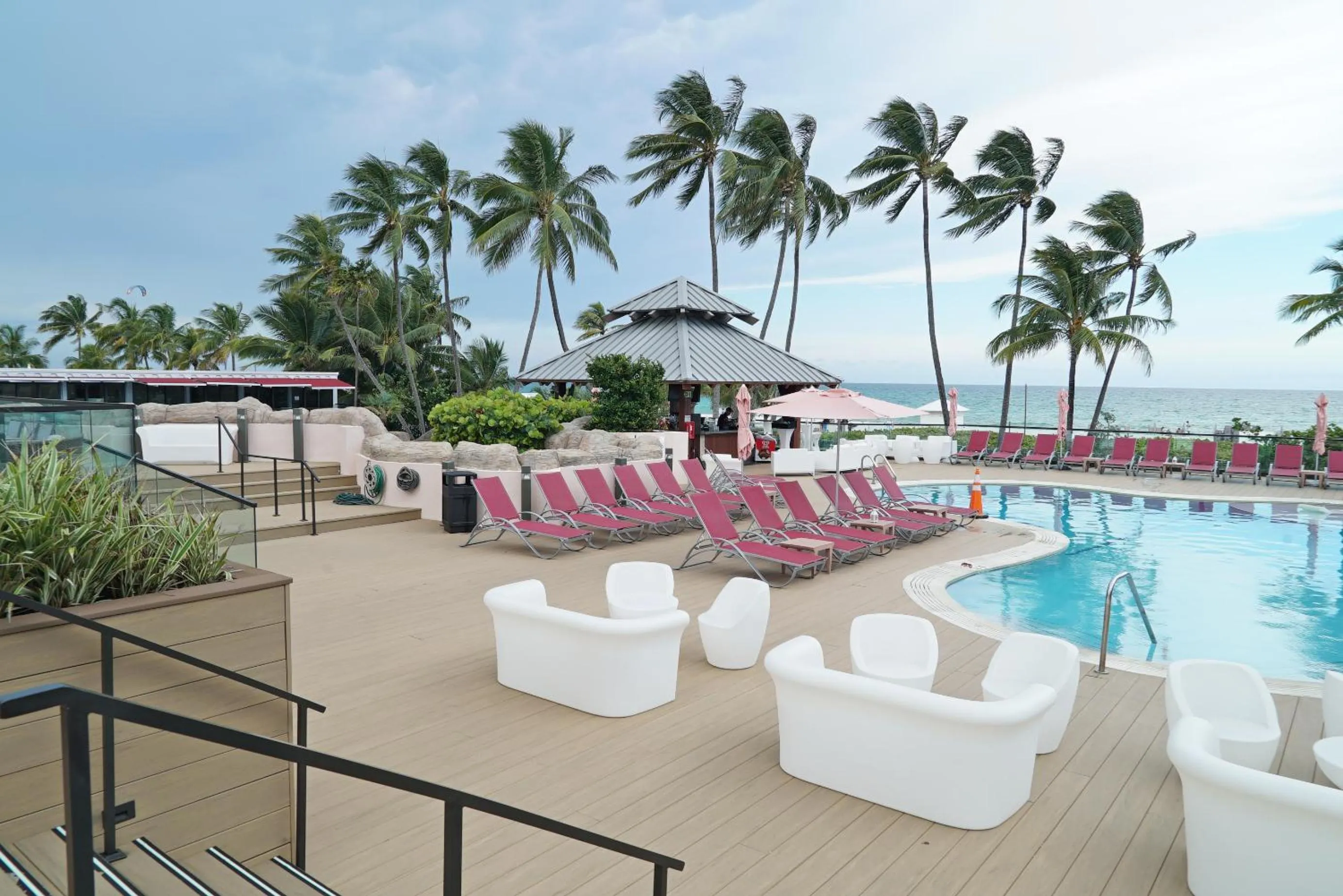 Swimming pool in Deluxe Apartments by South Florida Vacations