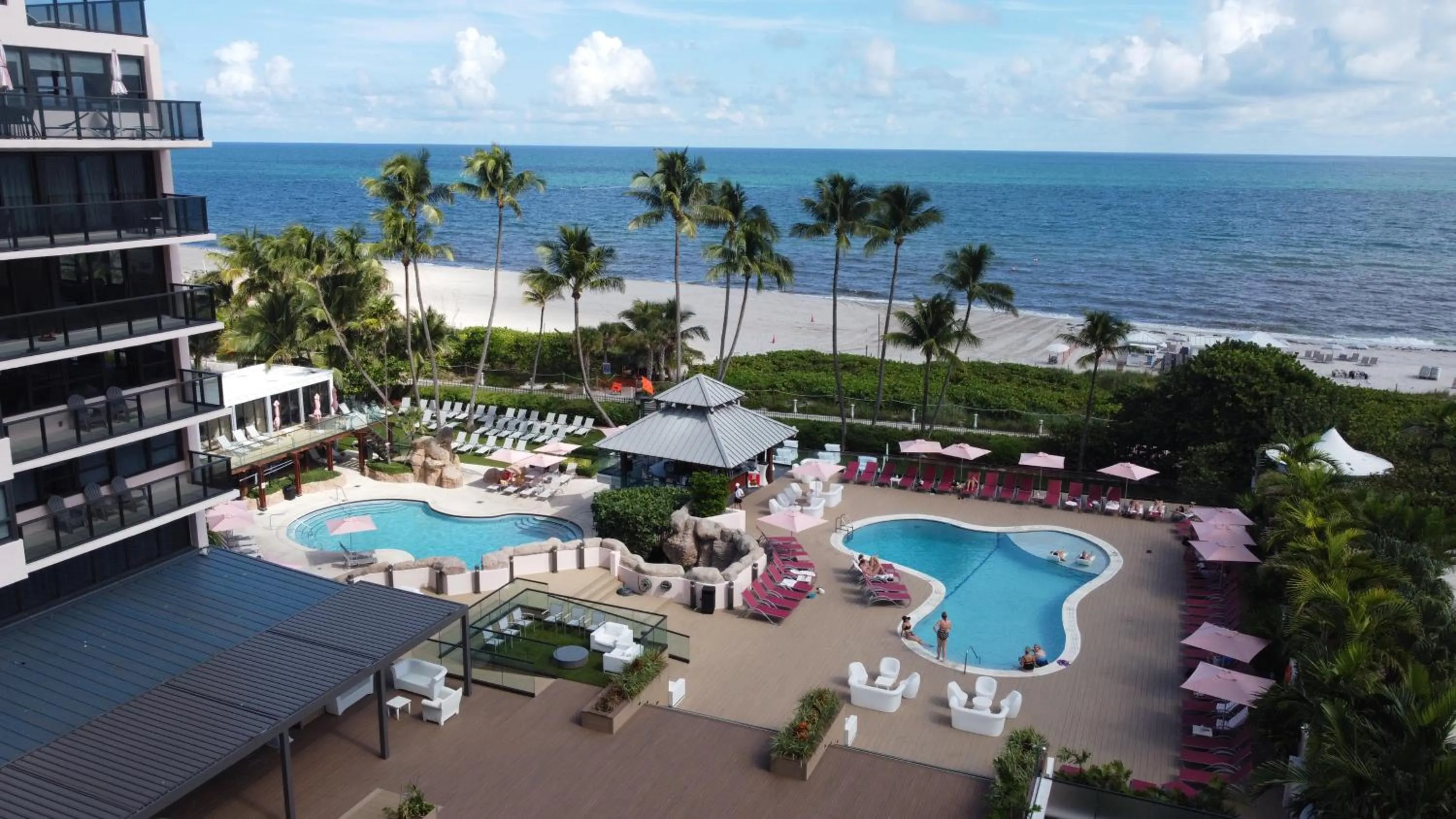 Swimming pool in Deluxe Apartments by South Florida Vacations