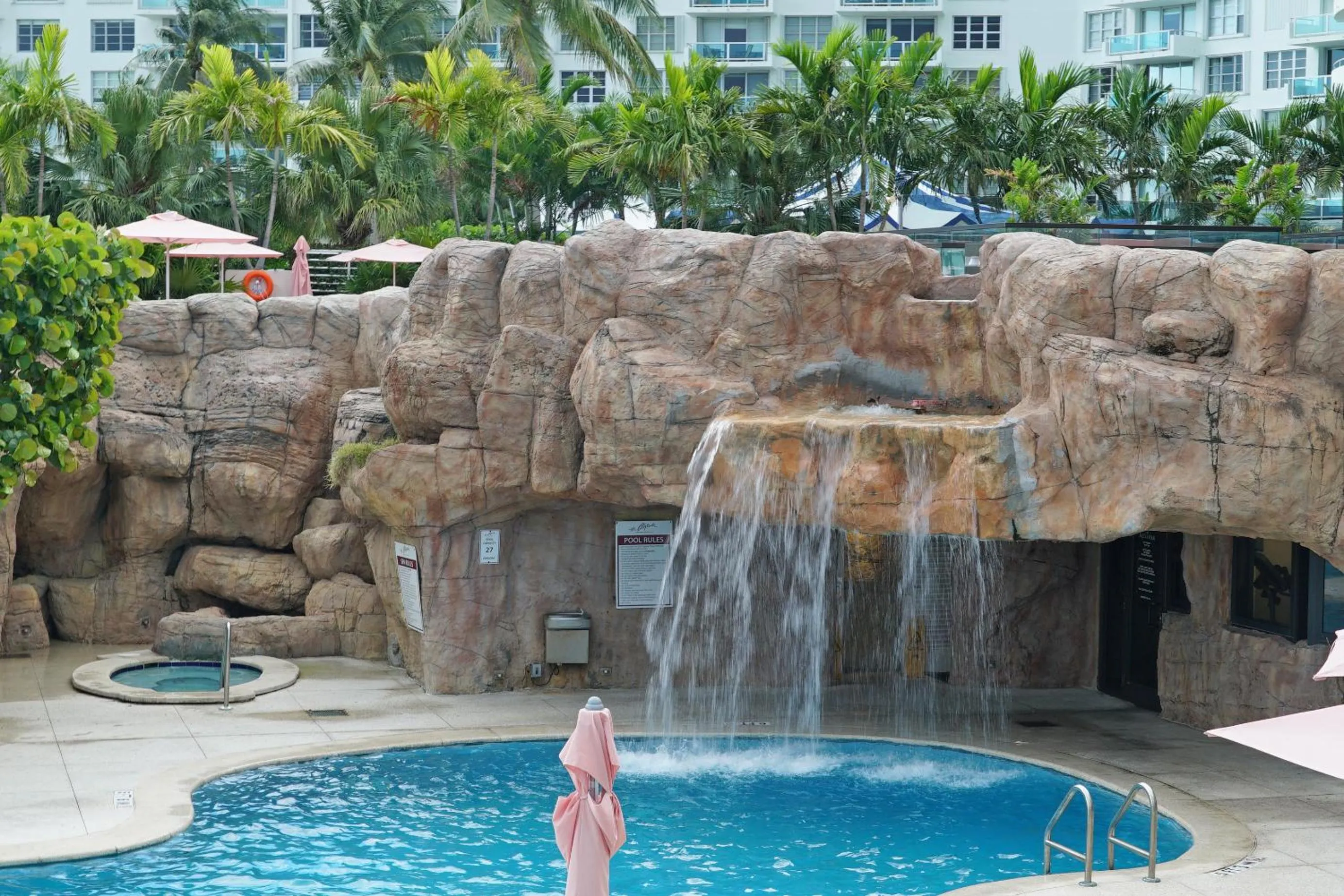 Swimming pool in Deluxe Apartments by South Florida Vacations