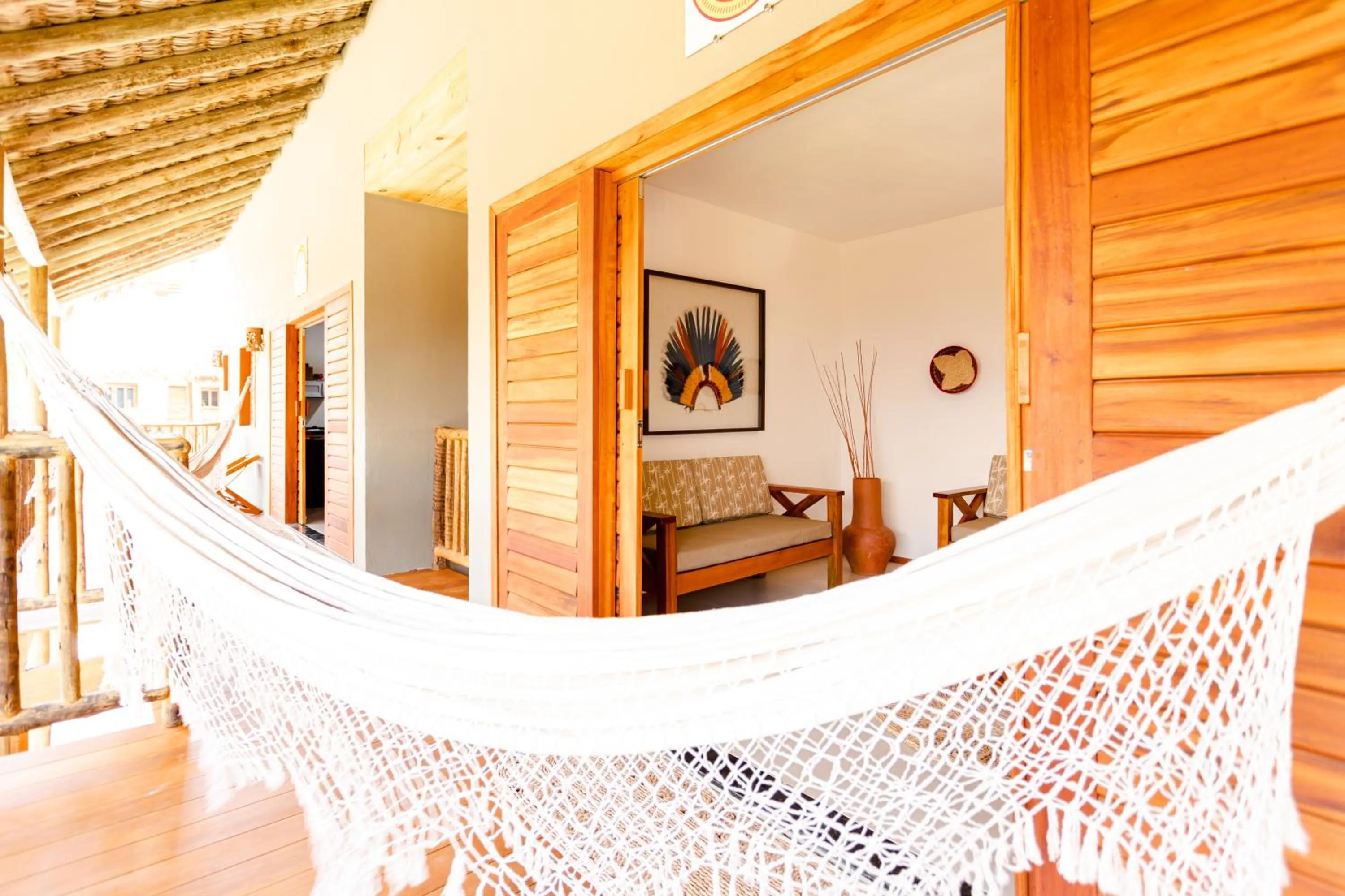 Balcony/Terrace, Bed in UNKUÉ POUSADA FLATS