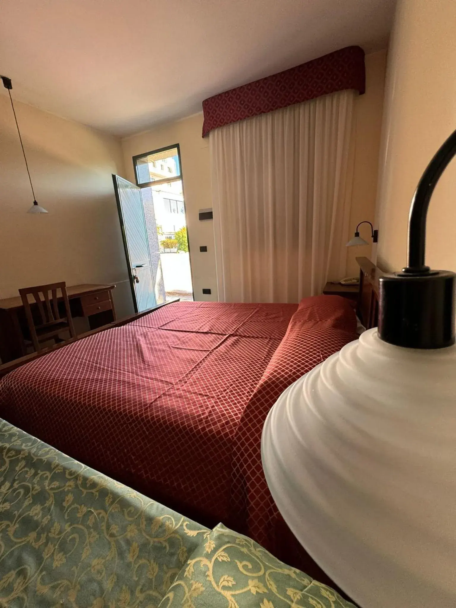 Bed in Hotel Arcobaleno Bed in Hotel Arcobaleno