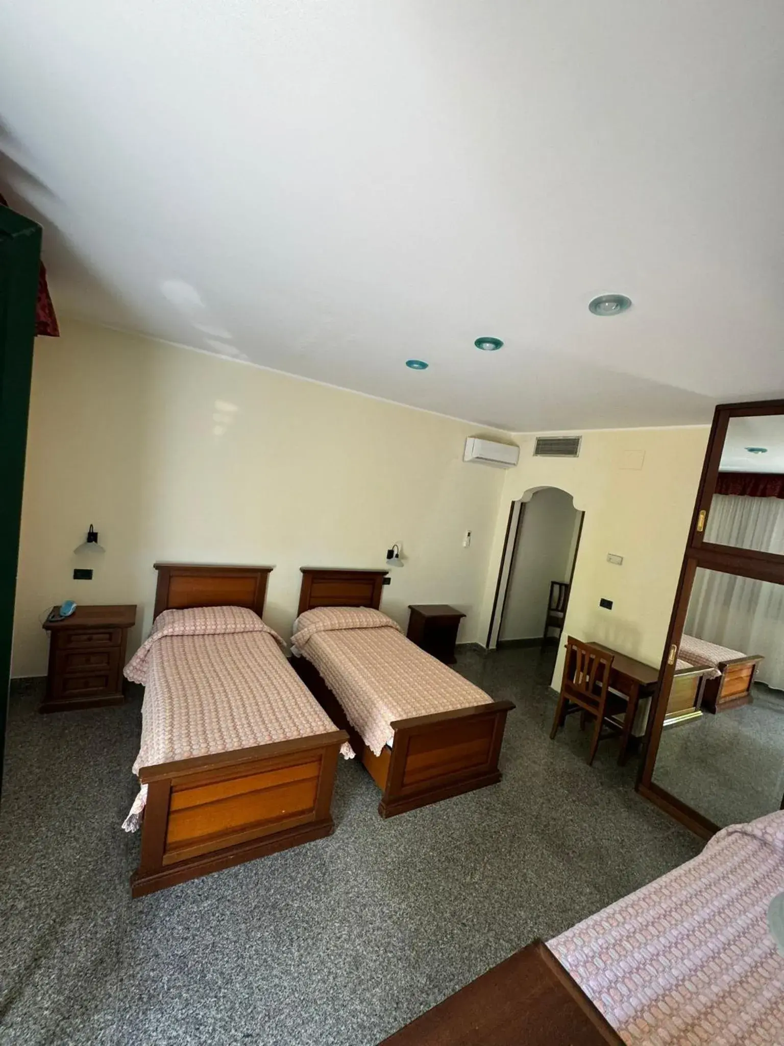 Bed in Hotel Arcobaleno Bed in Hotel Arcobaleno