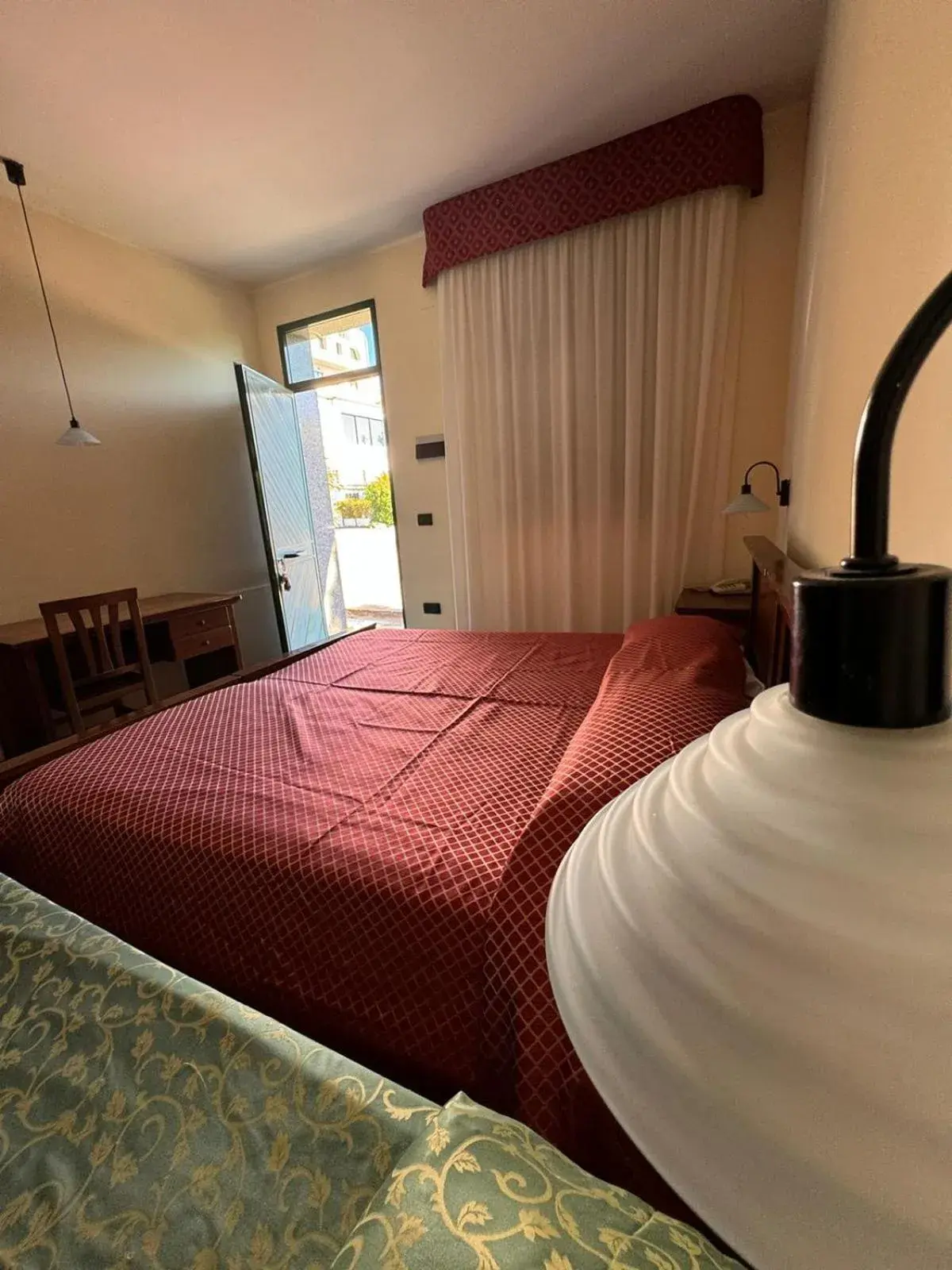 Bed in Hotel Arcobaleno Bed in Hotel Arcobaleno