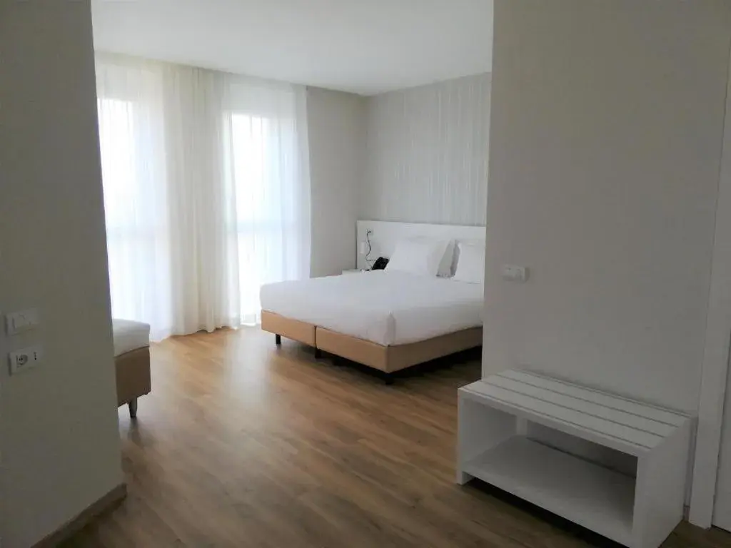 Bed in Novo Hotel Rossi Bed in Novo Hotel Rossi