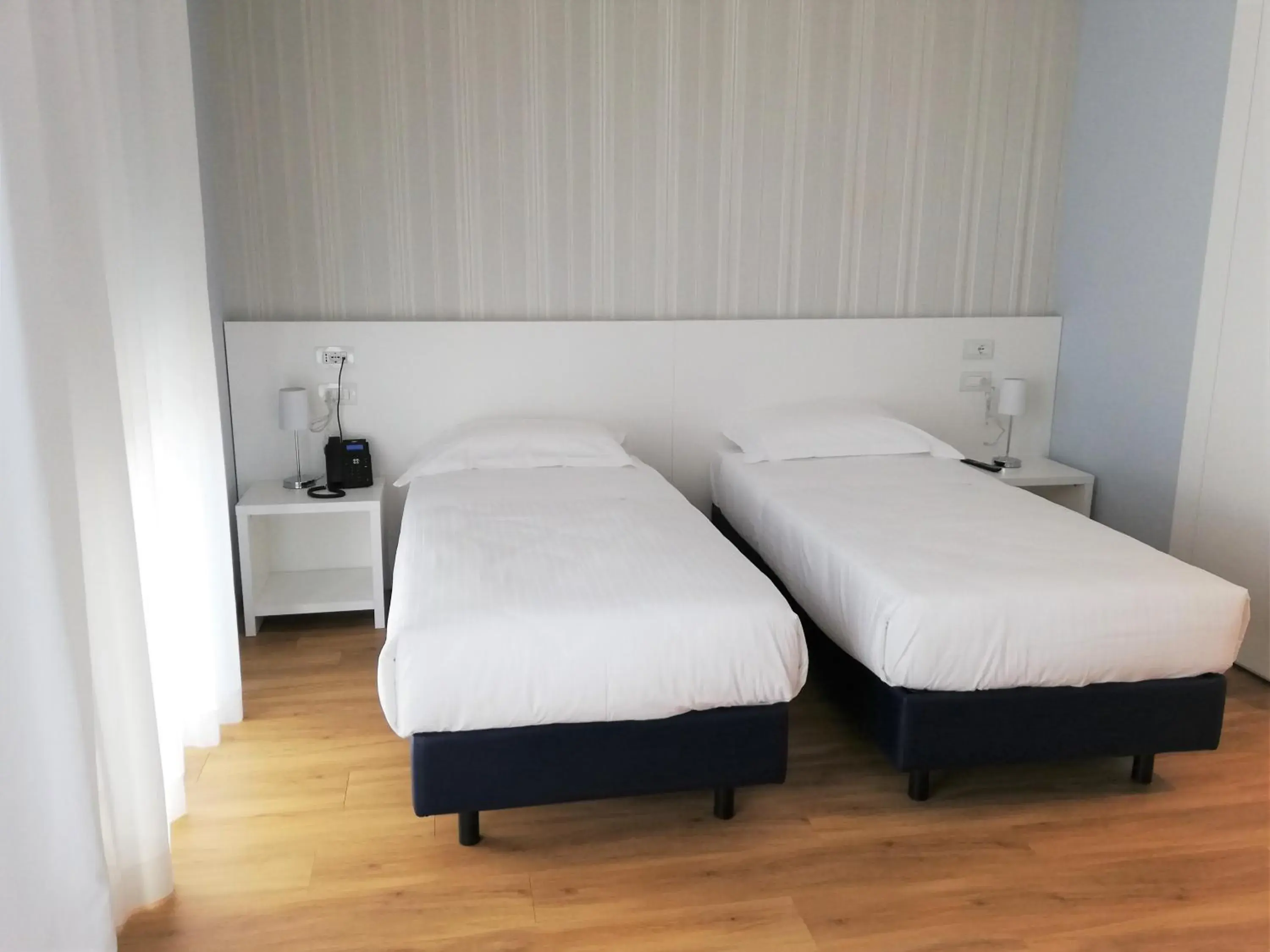 Bed in Novo Hotel Rossi Bed in Novo Hotel Rossi