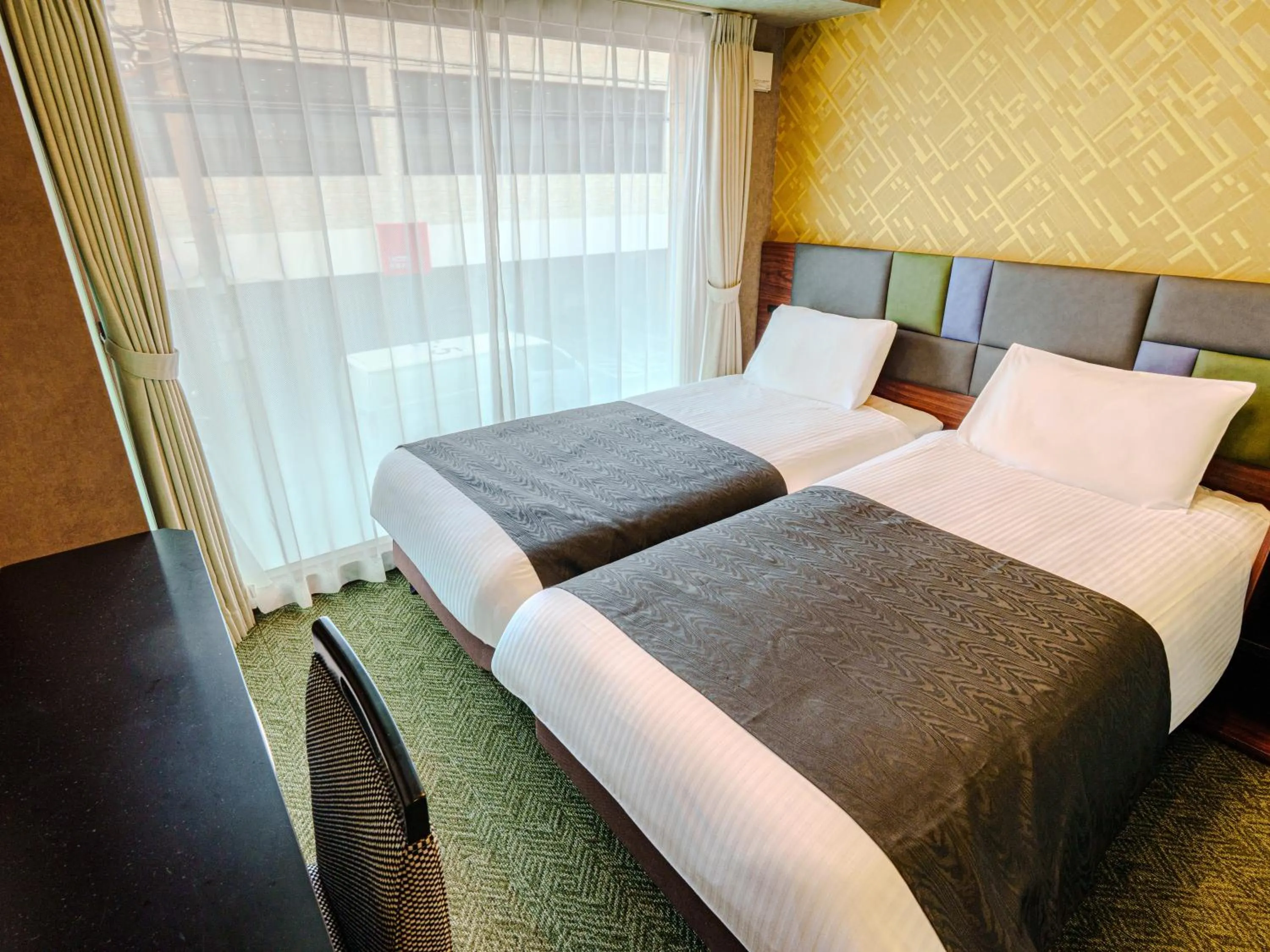 Photo of the whole room, Bed in APA Hotel Naha Airport Wakasa