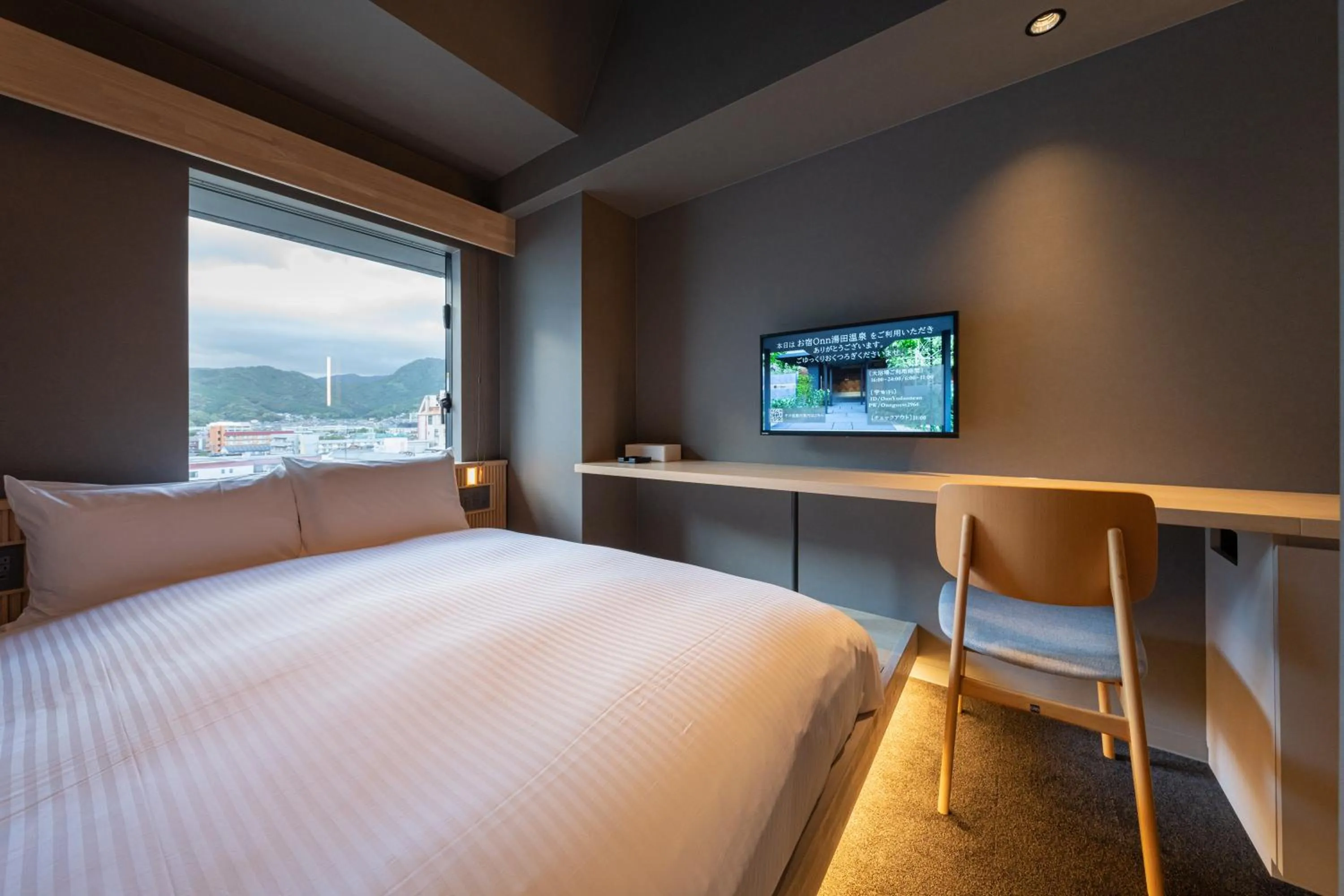 Photo of the whole room, Bed in Onn Yuda Onsen