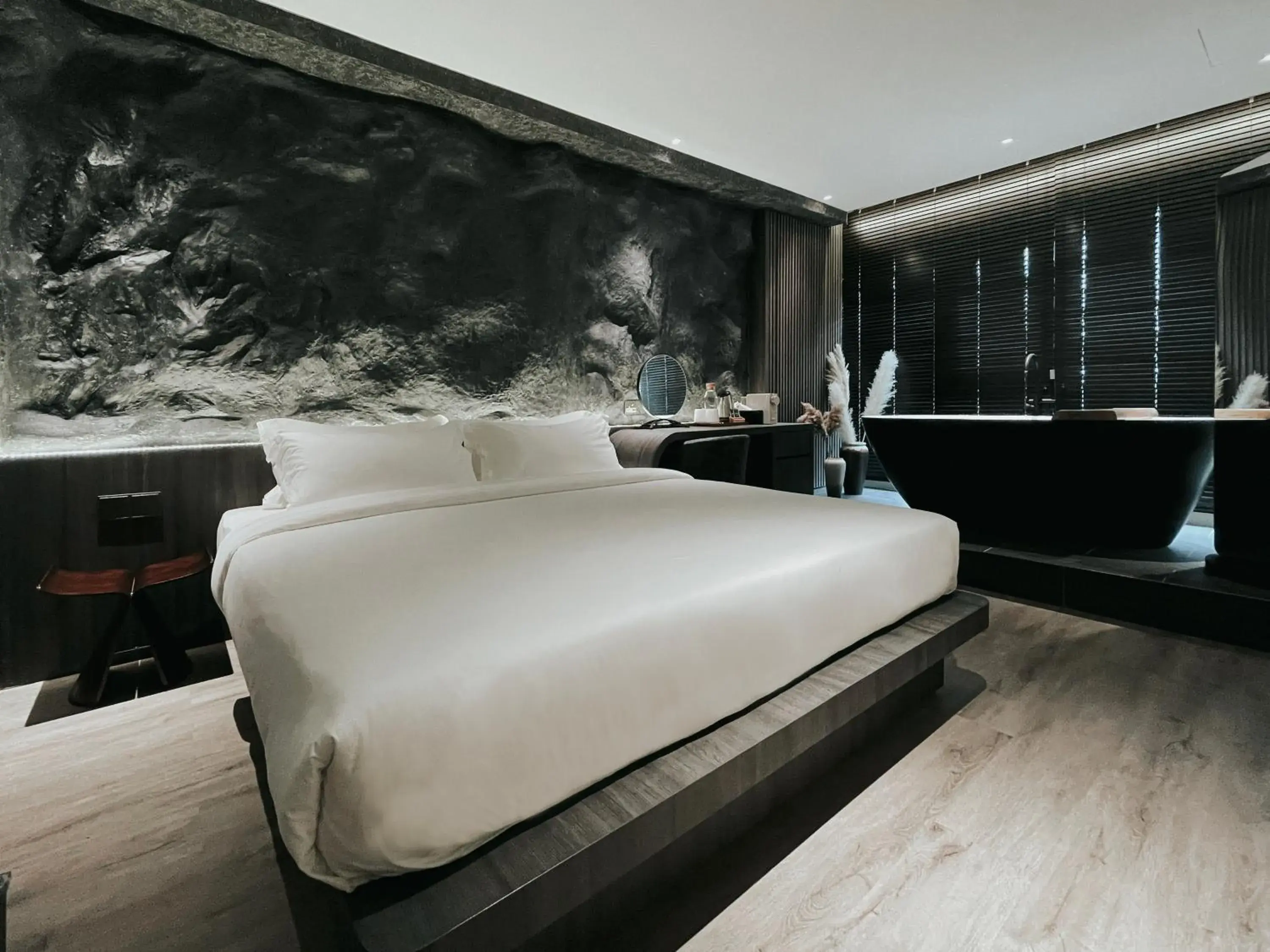 Bed in The Cara Boutique Hotel