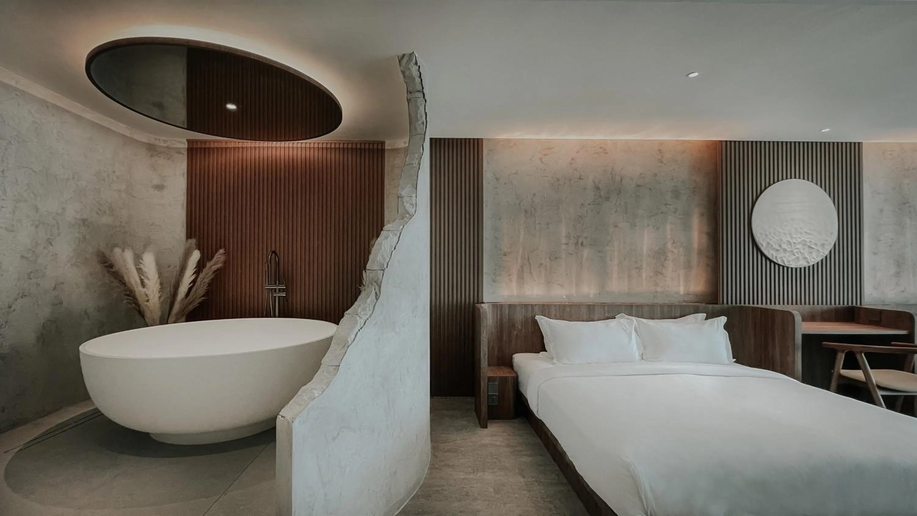 Bed in The Cara Boutique Hotel