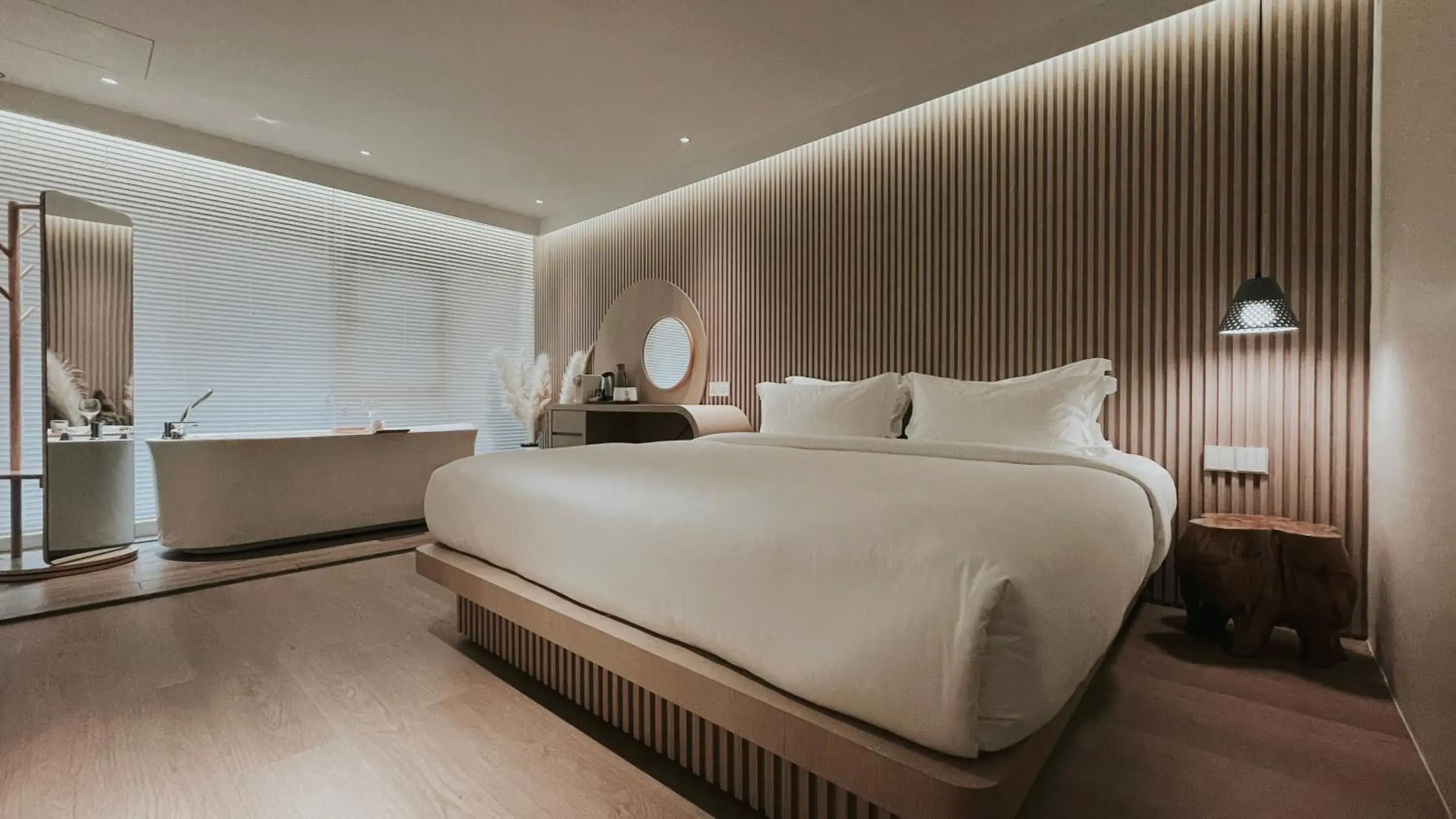 Bed in The Cara Boutique Hotel