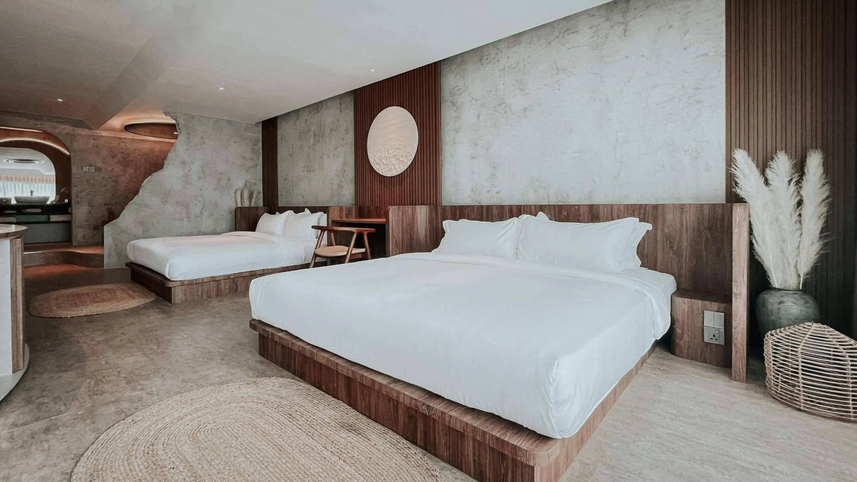 Bed in The Cara Boutique Hotel
