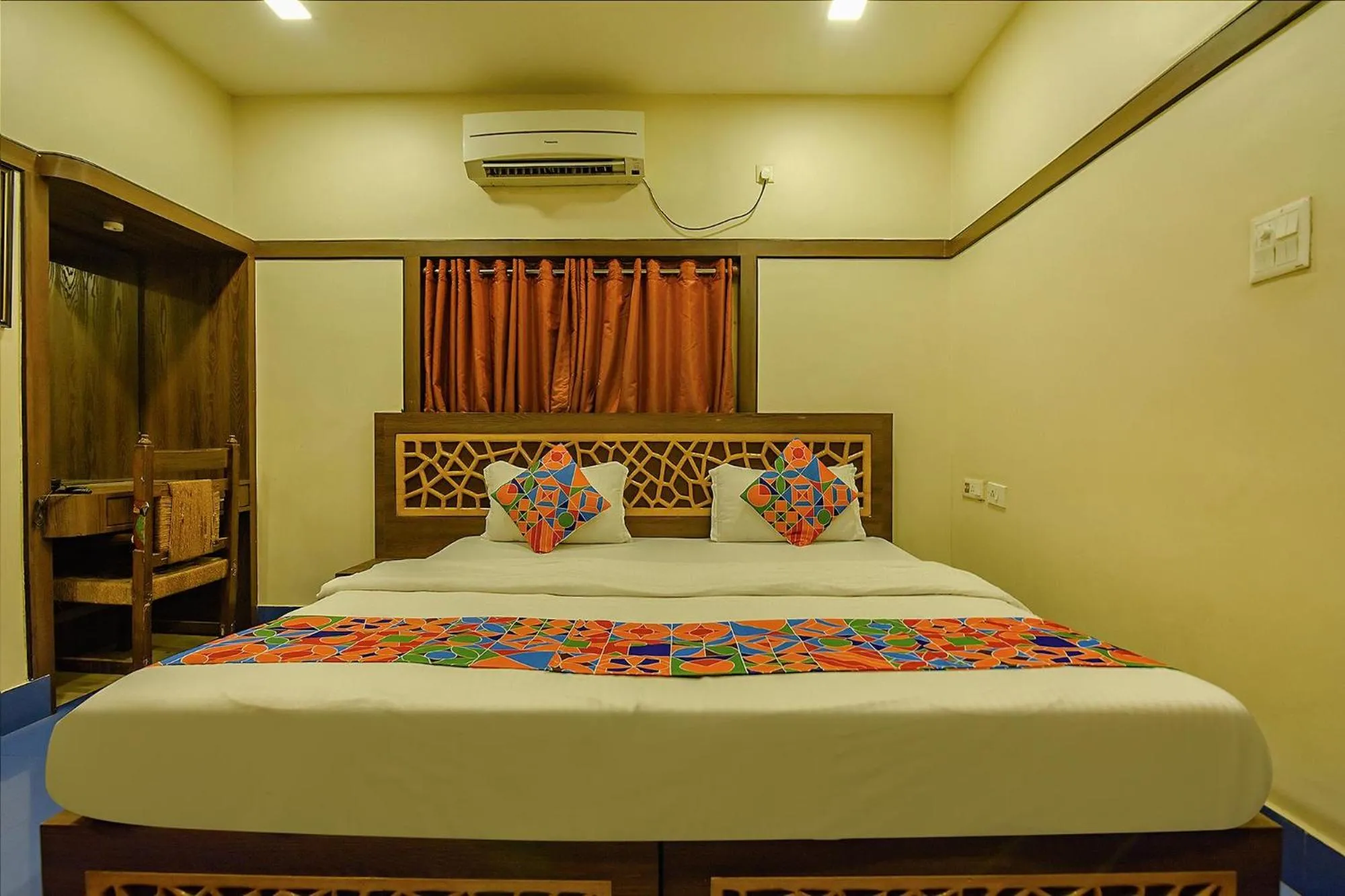 Bed in FabHotel Shivalya