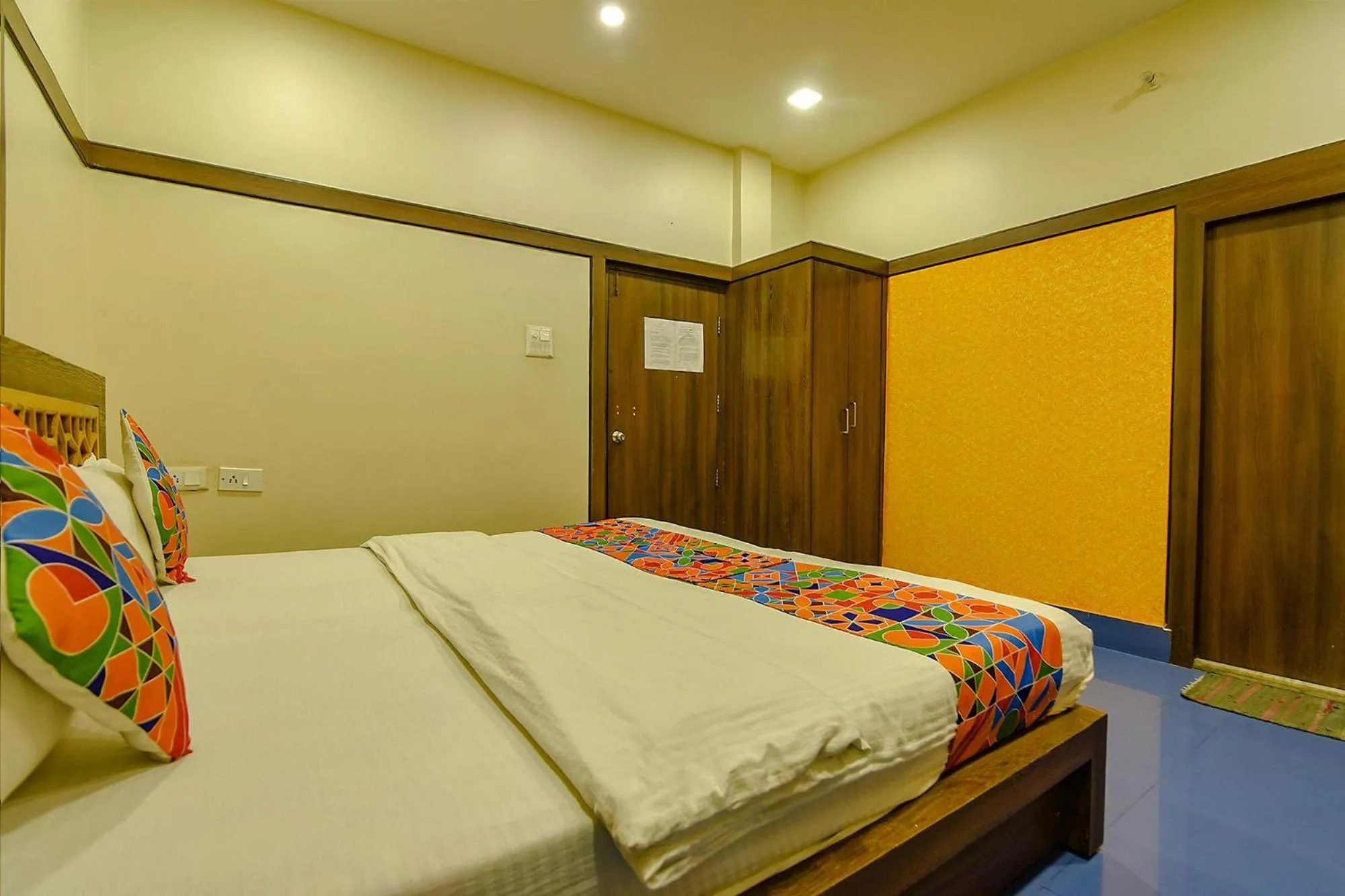 Bed in FabHotel Shivalya