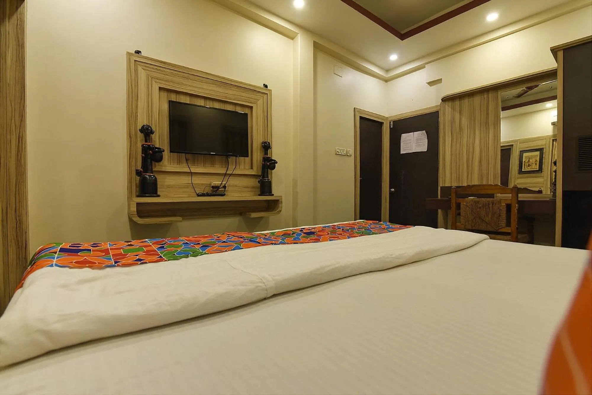 Bed in FabHotel Shivalya