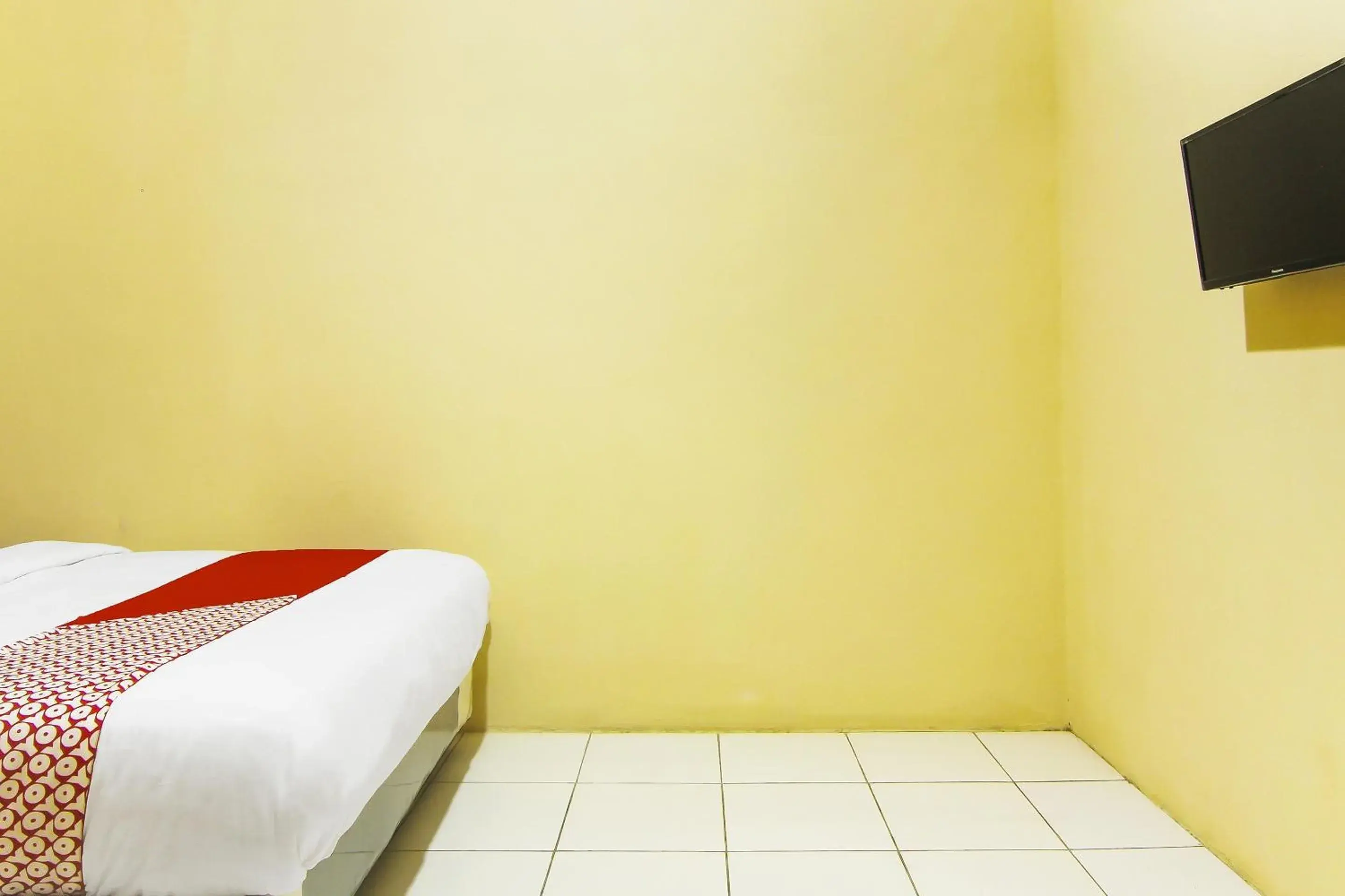 Bedroom in Hotel O Pagi Sore Residence Bedroom in Hotel O Pagi Sore Residence