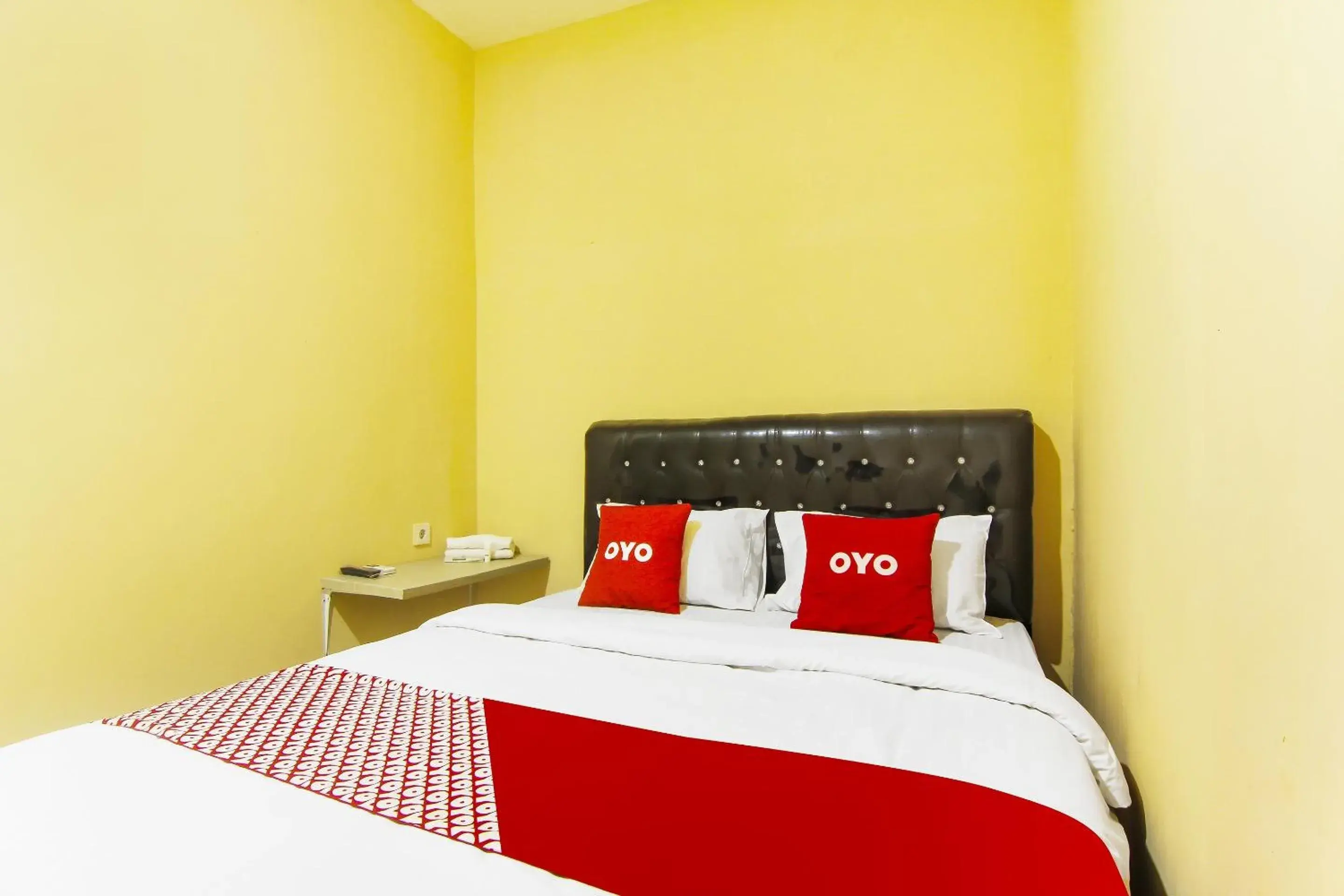 Bedroom in Hotel O Pagi Sore Residence Bedroom in Hotel O Pagi Sore Residence