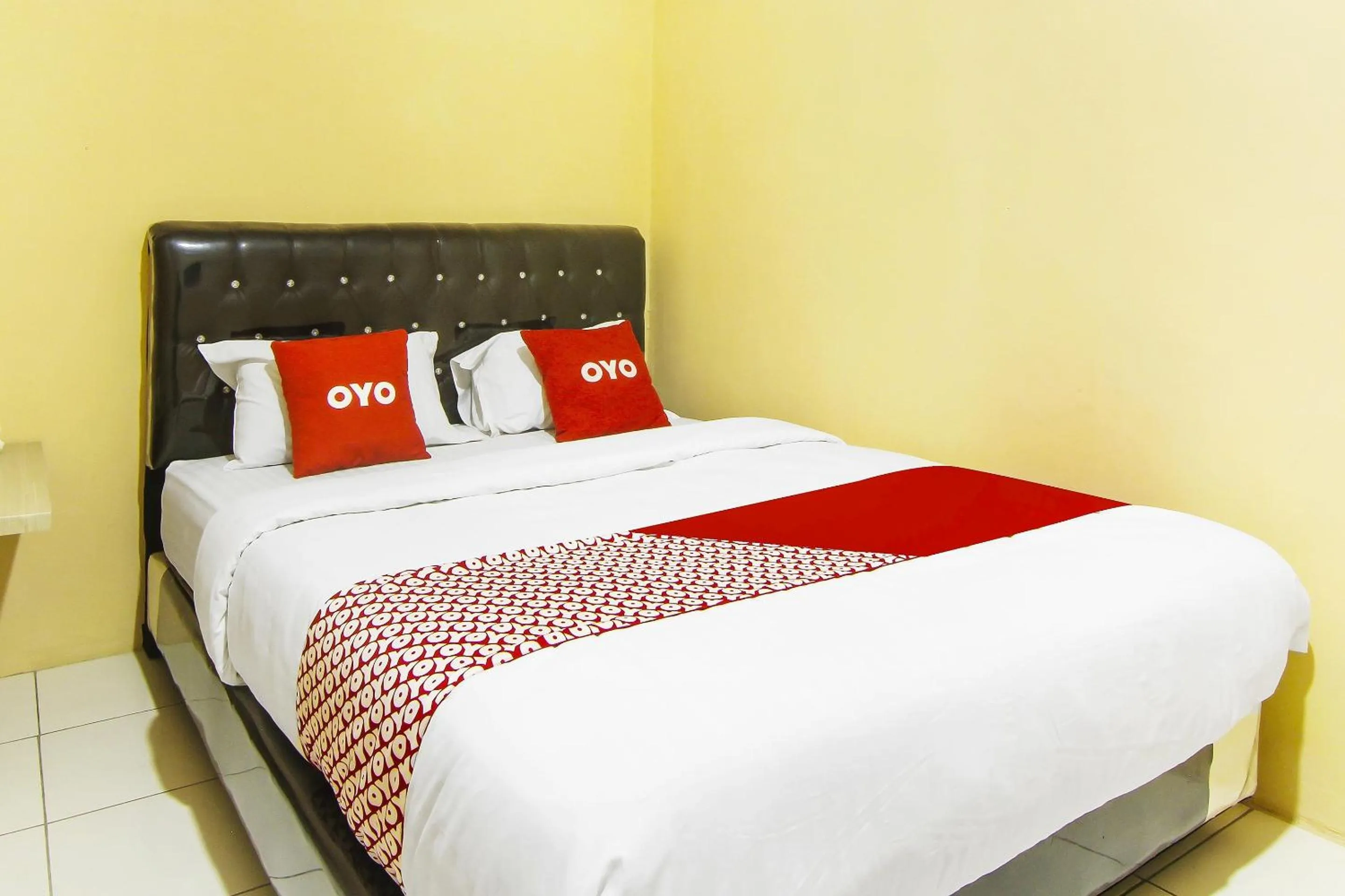 Bedroom in Hotel O Pagi Sore Residence