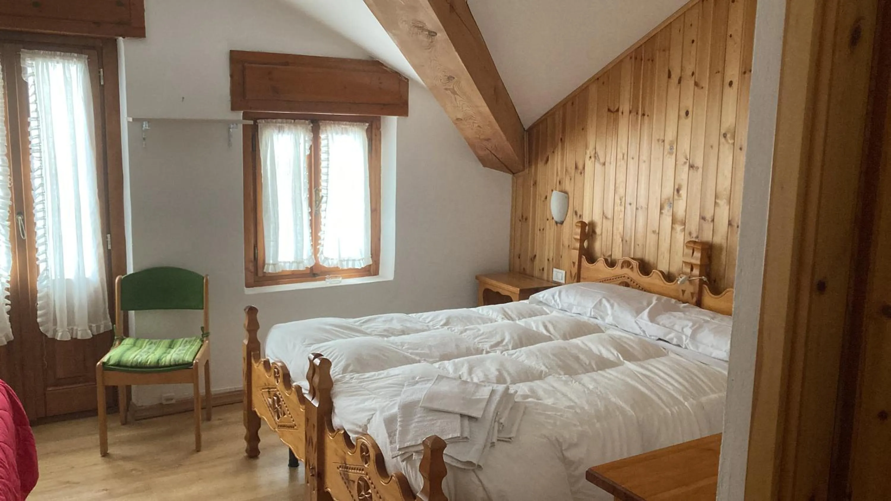 Bedroom in Hotel Beau Sejour