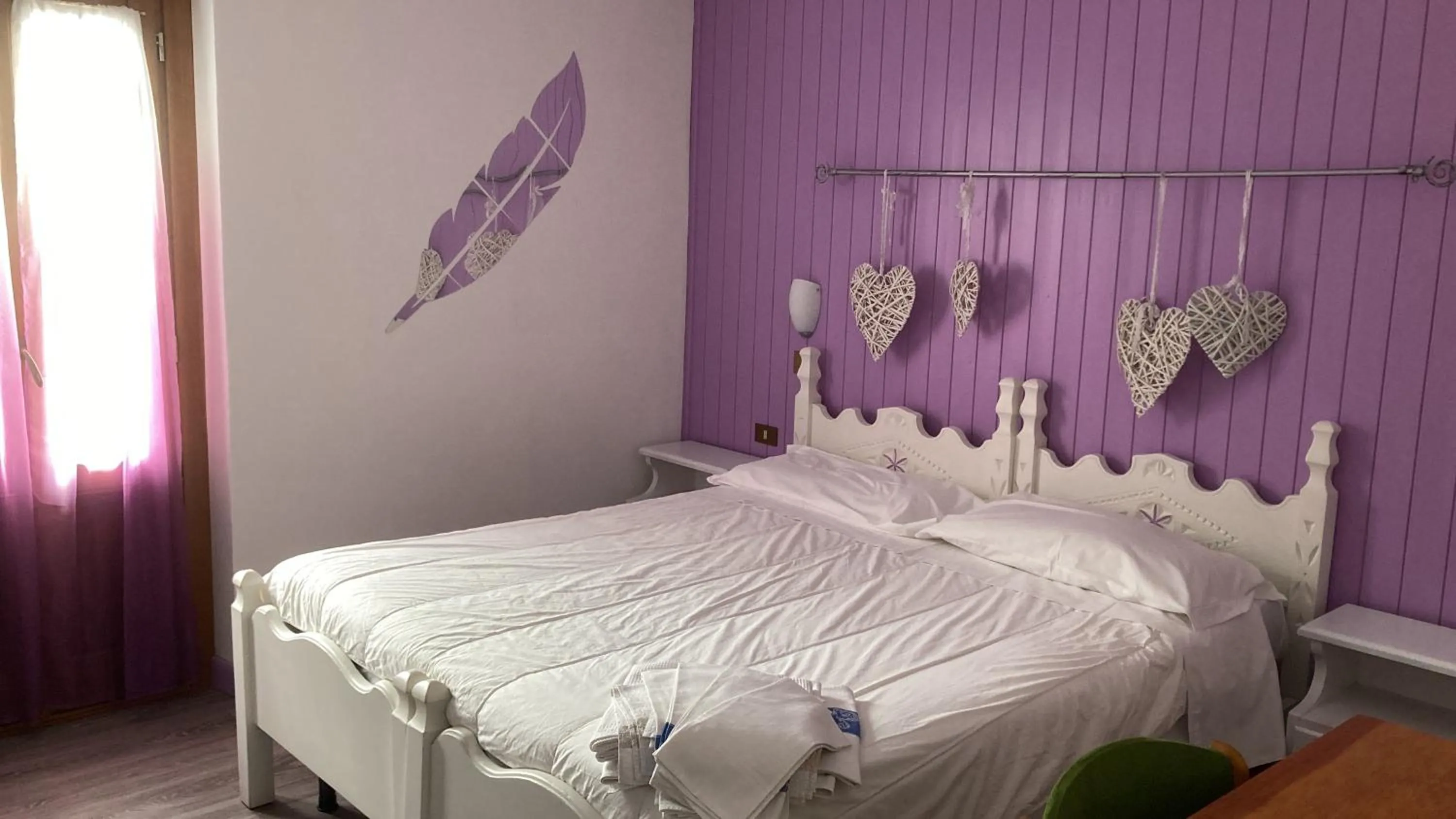 Bedroom in Hotel Beau Sejour