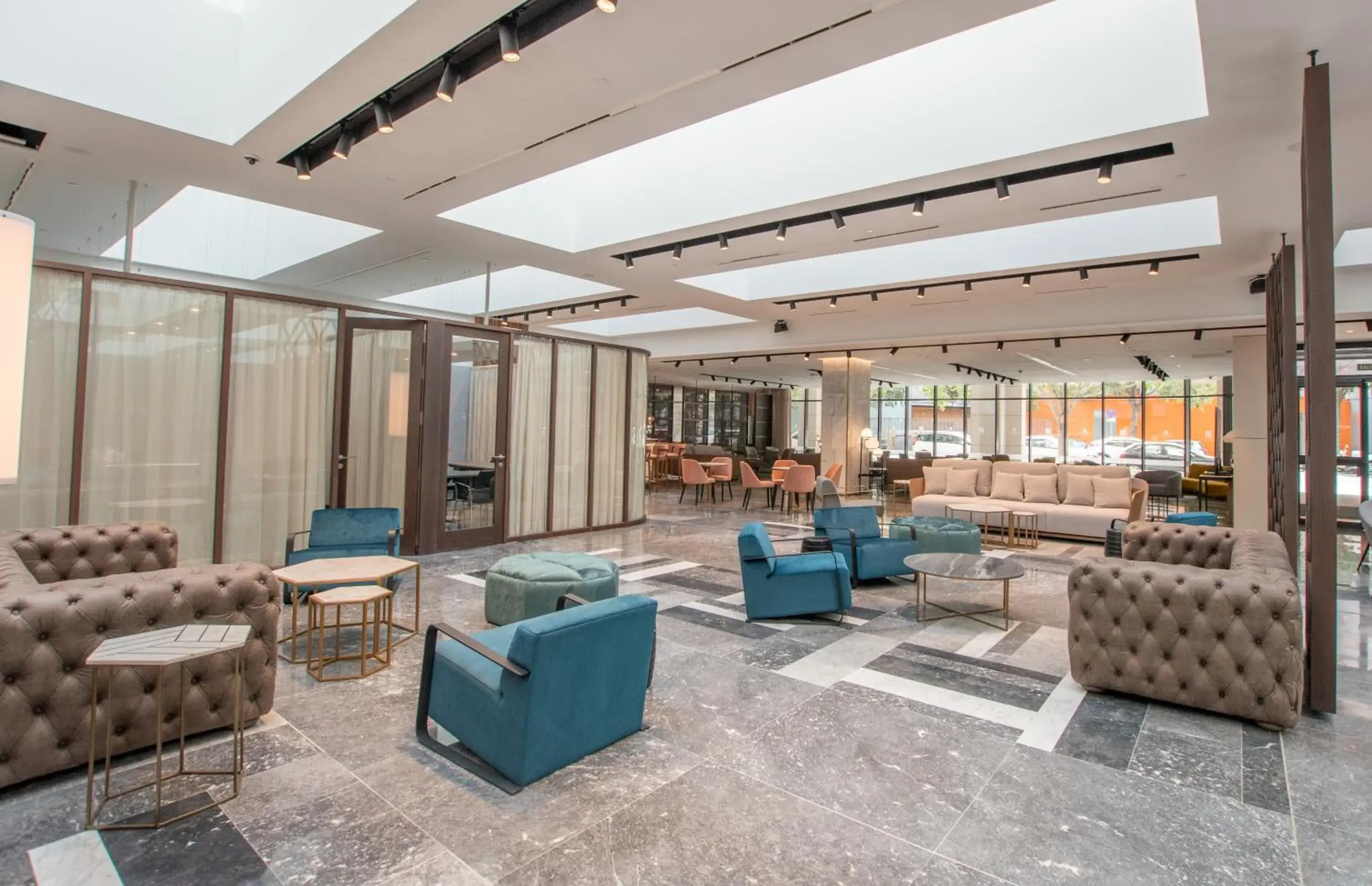 Lobby or reception in Hotel Giralda Center Lobby or reception in Hotel Giralda Center
