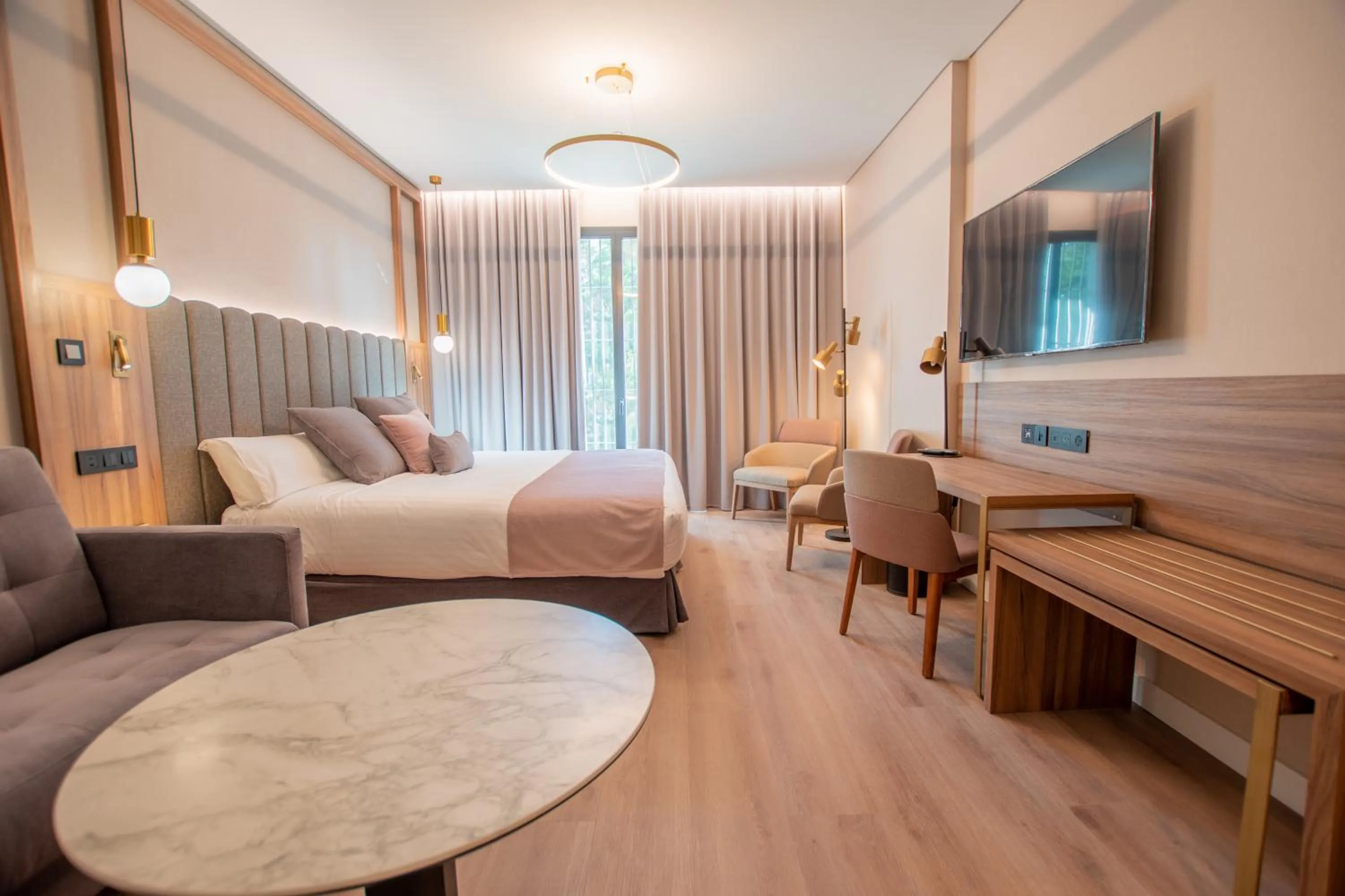 Bed in Hotel Giralda Center