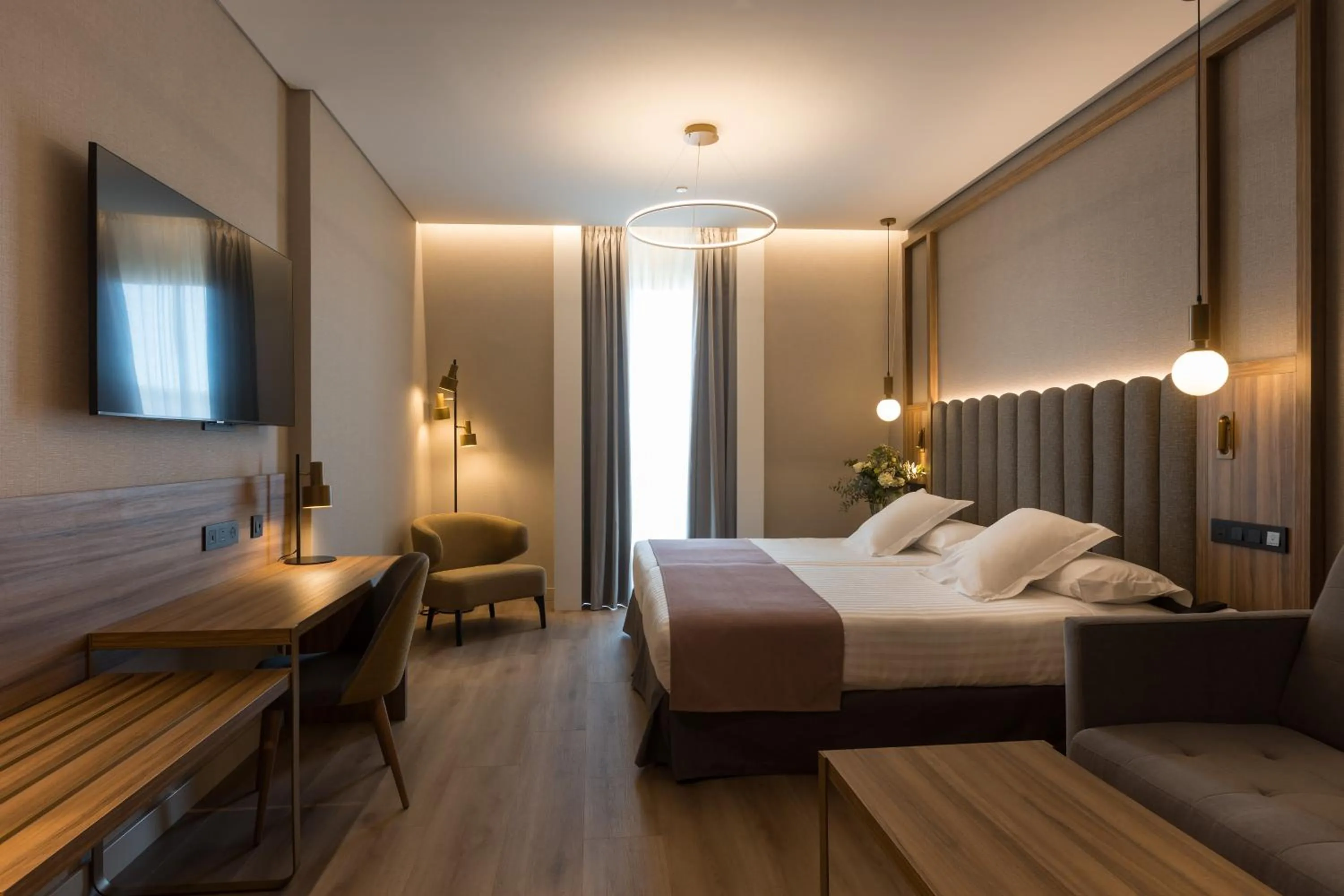 Bed in Hotel Giralda Center