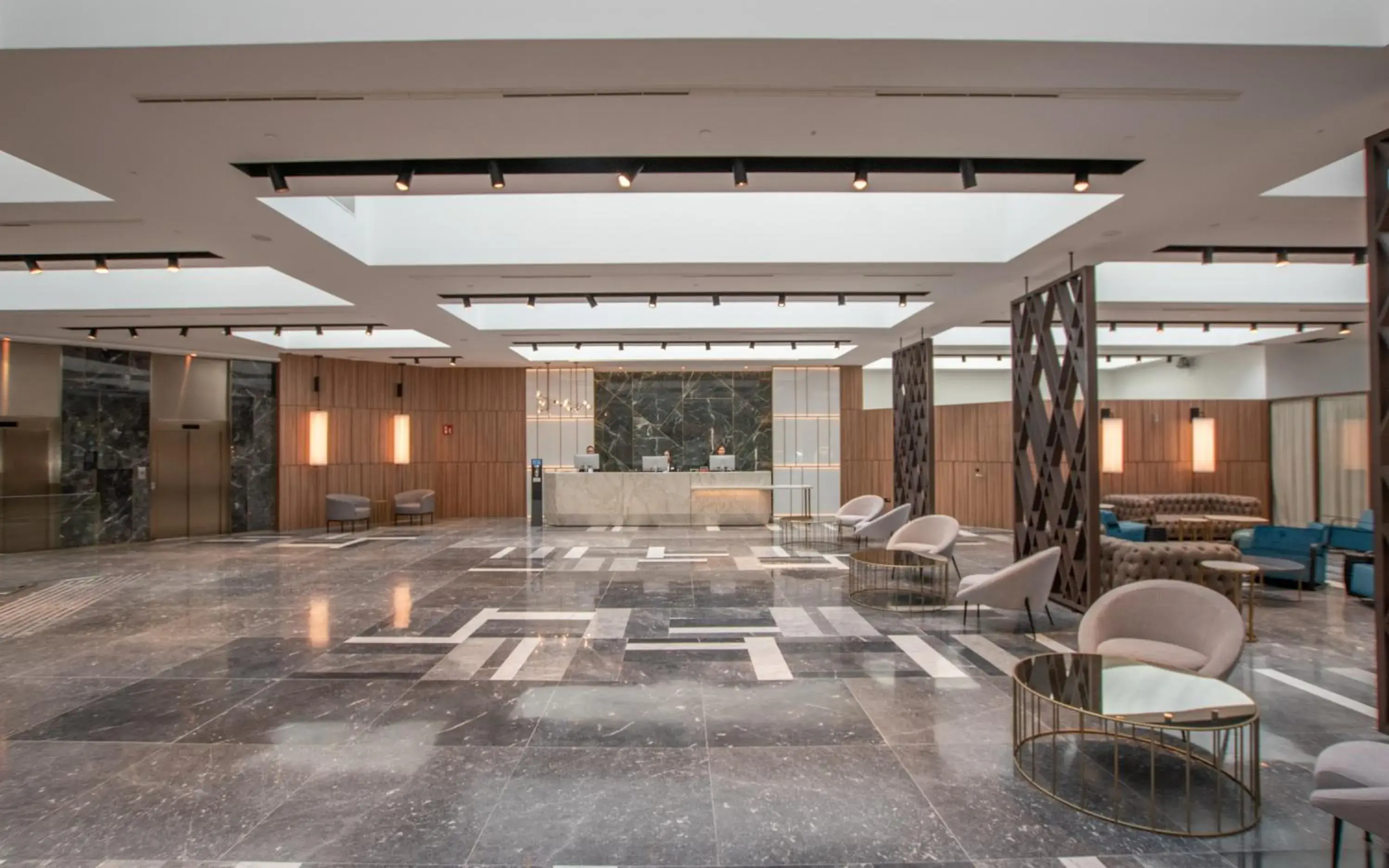 Lobby or reception in Hotel Giralda Center Lobby or reception in Hotel Giralda Center