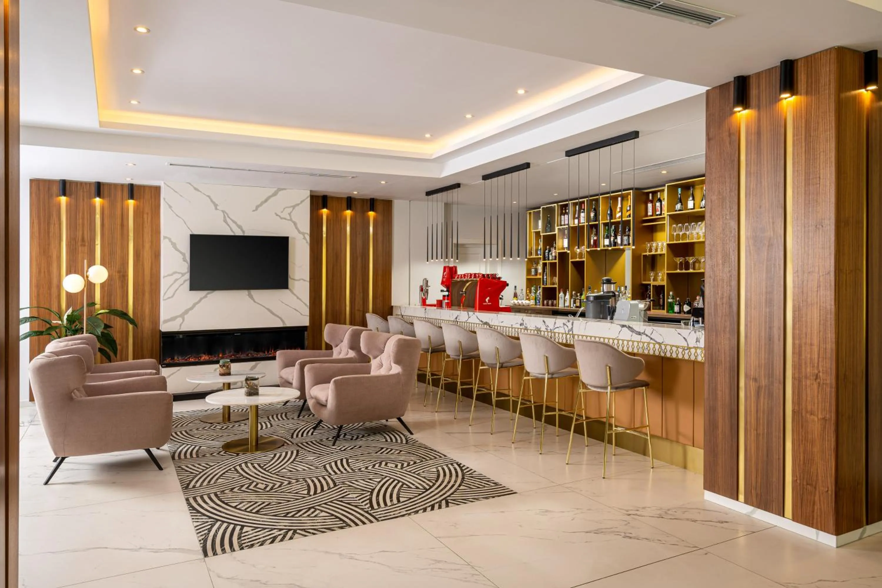 Communal lounge/ TV room in Alma Health & Spa Retreat