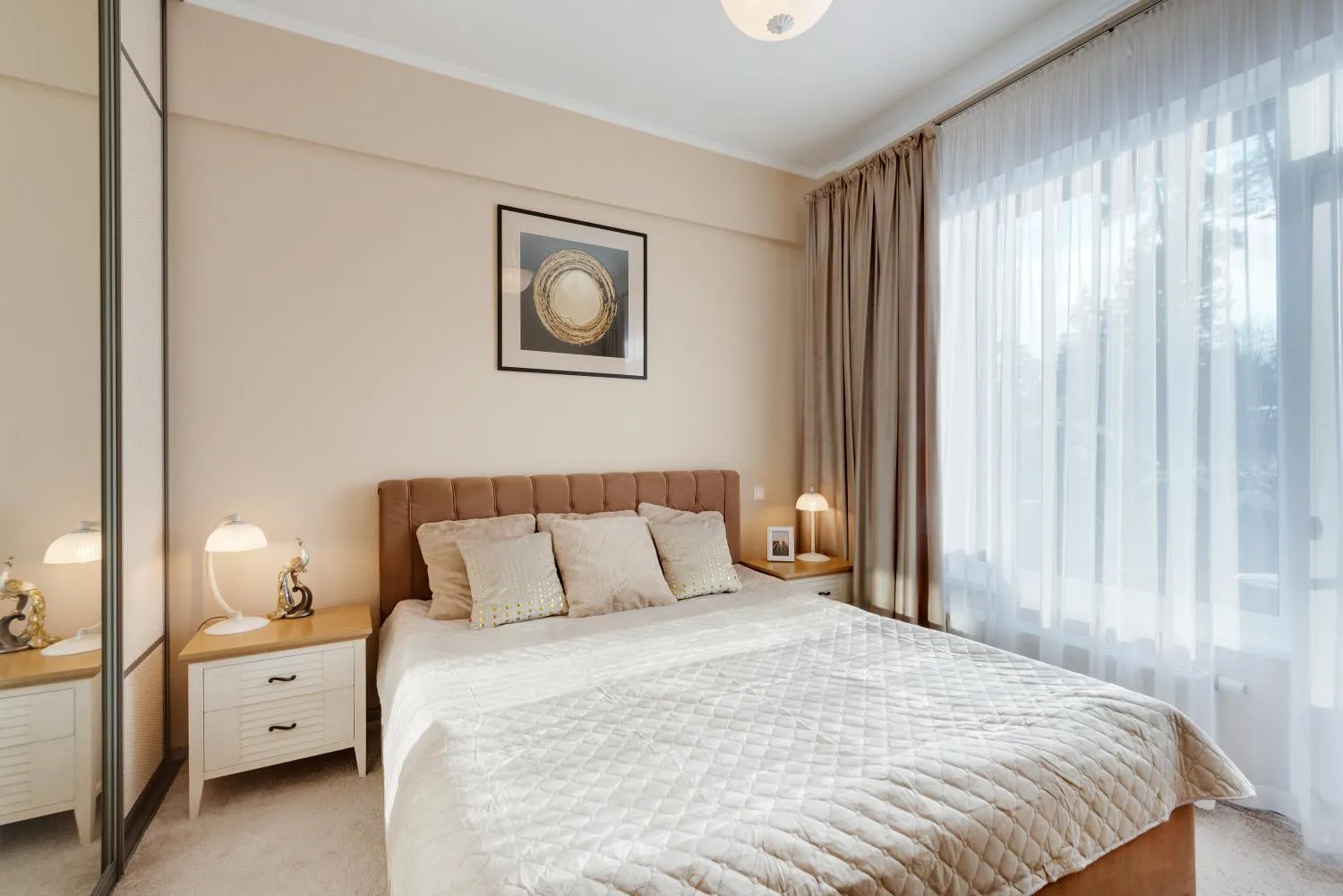 Bed in Turaidas Kvartals Four Seasons Luxury Apartment