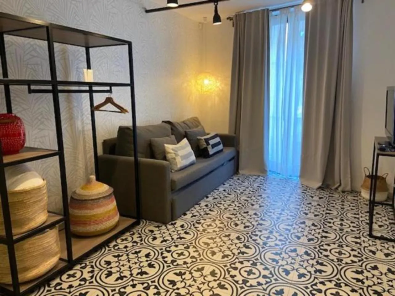 Living room in Liceu Apartments by gaiarooms