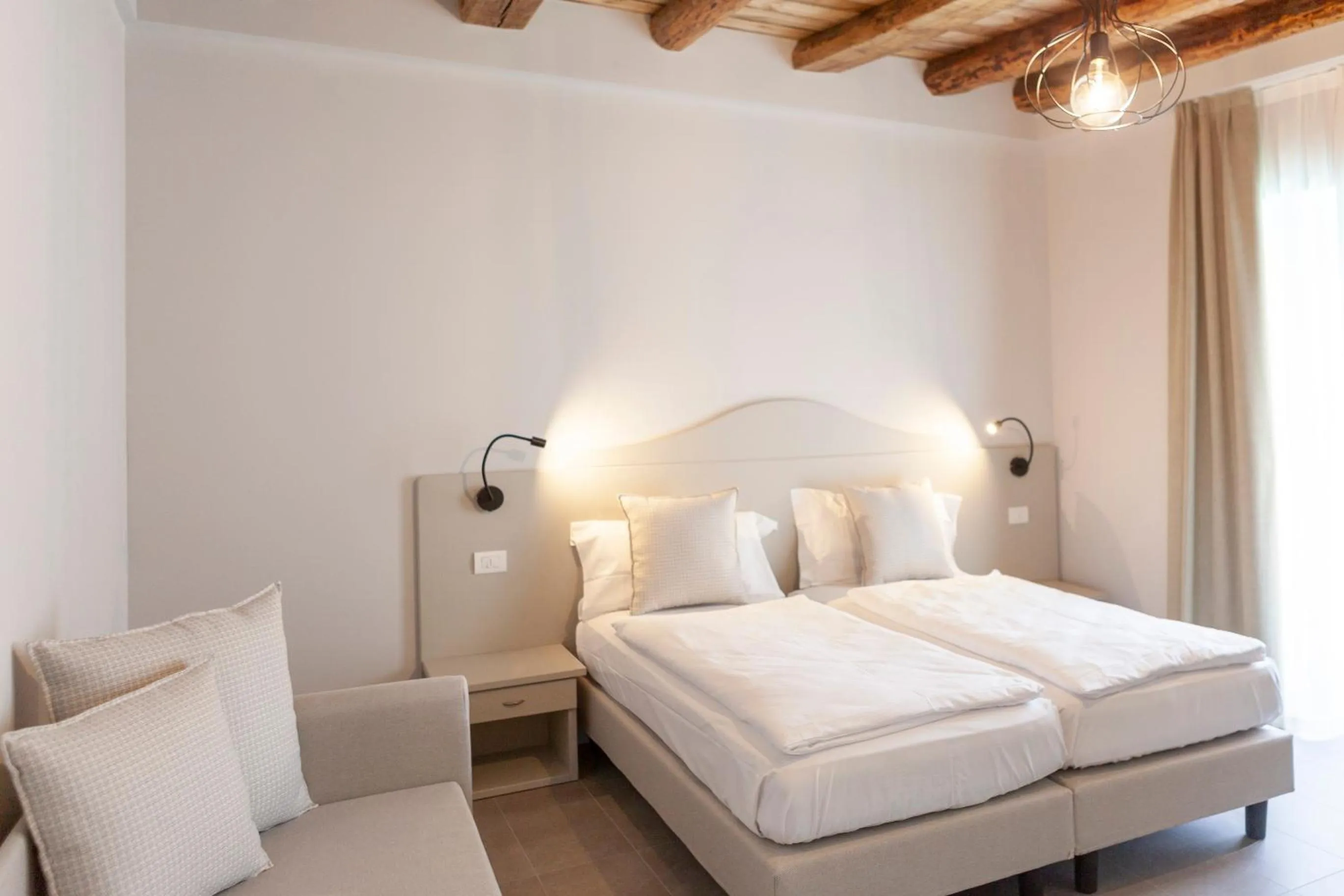 Bed in epOche Hotel Zanella 1889