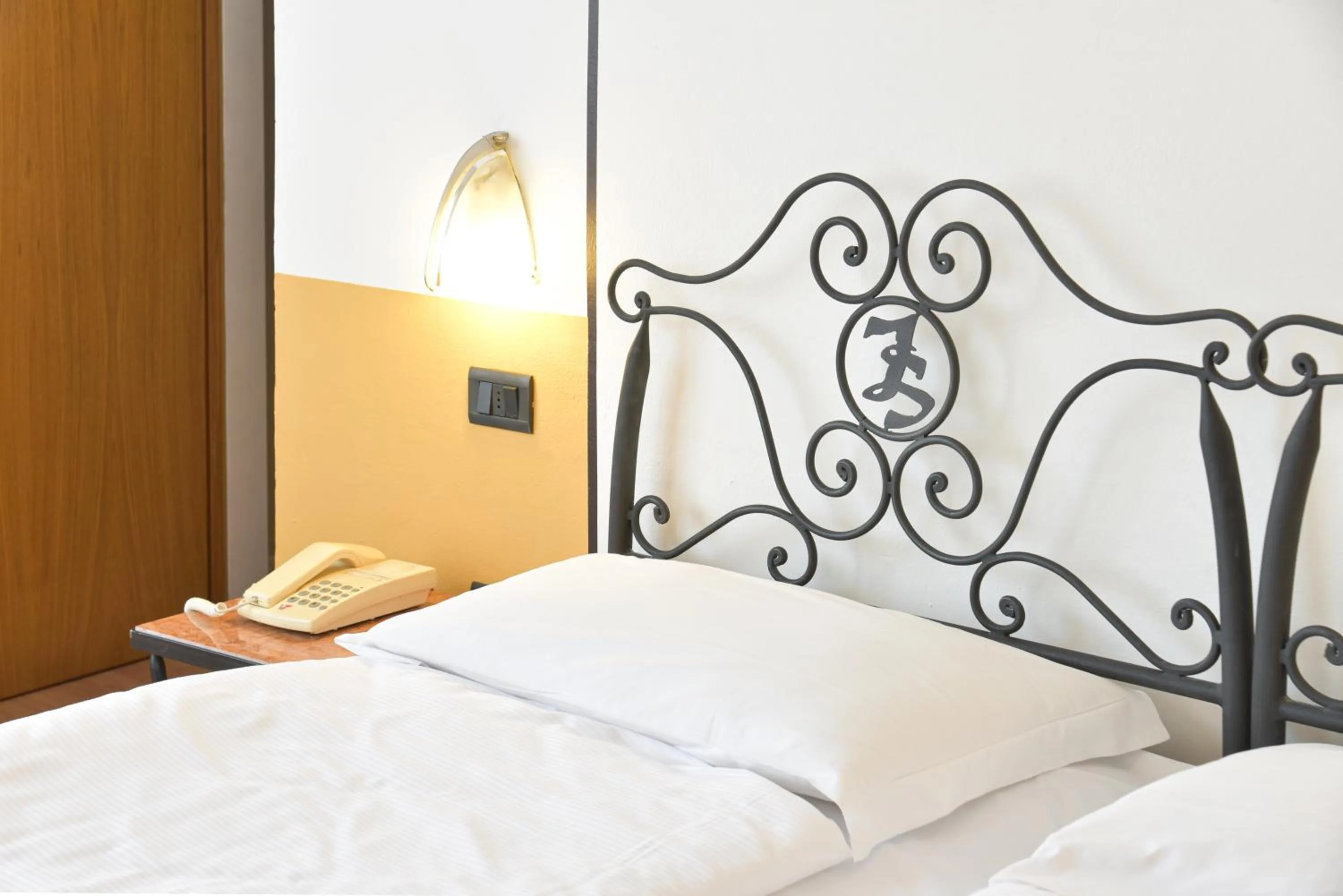 Bed in epOche Hotel Zanella 1889