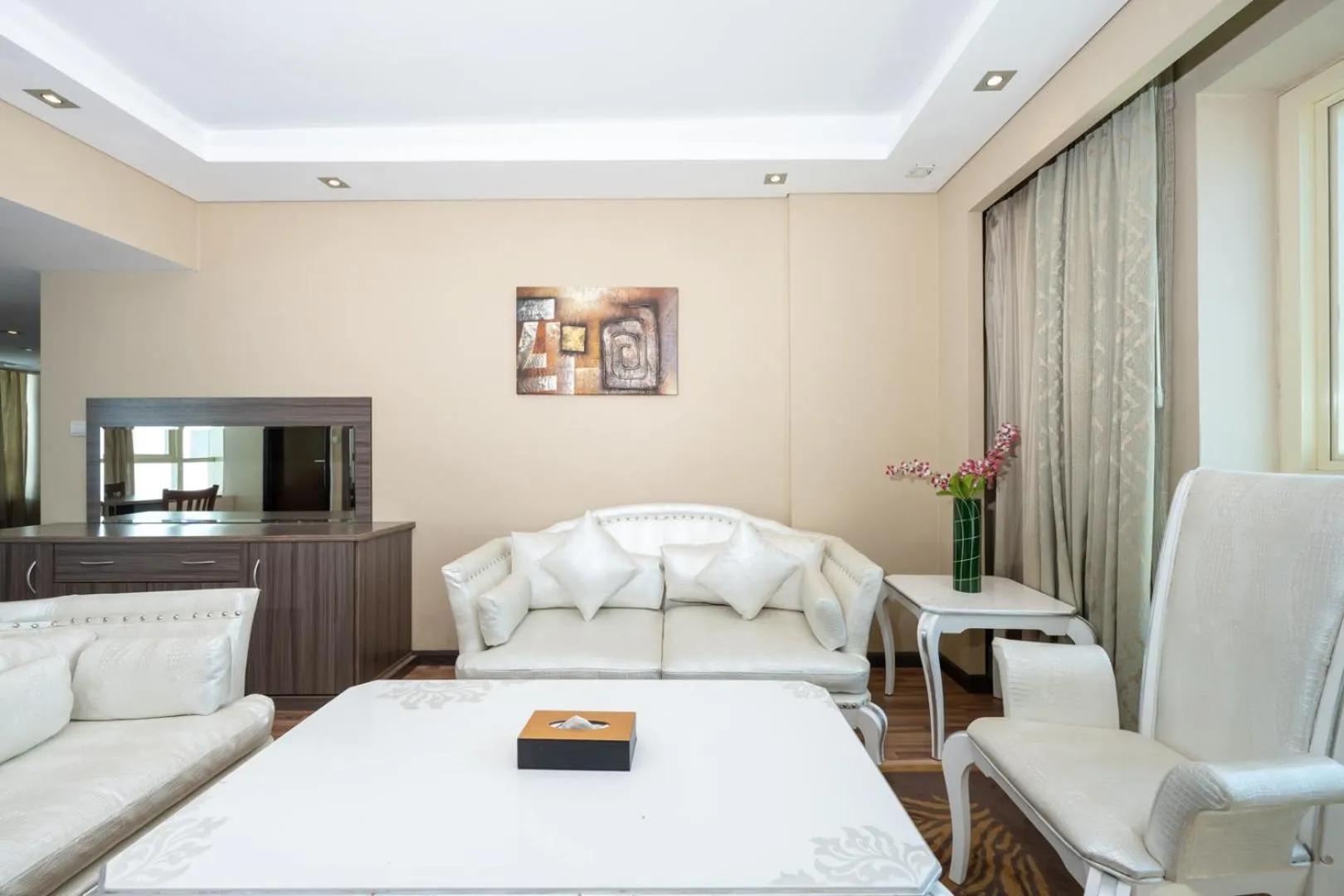 Living room, Bed in Pearl Swiss Hotel