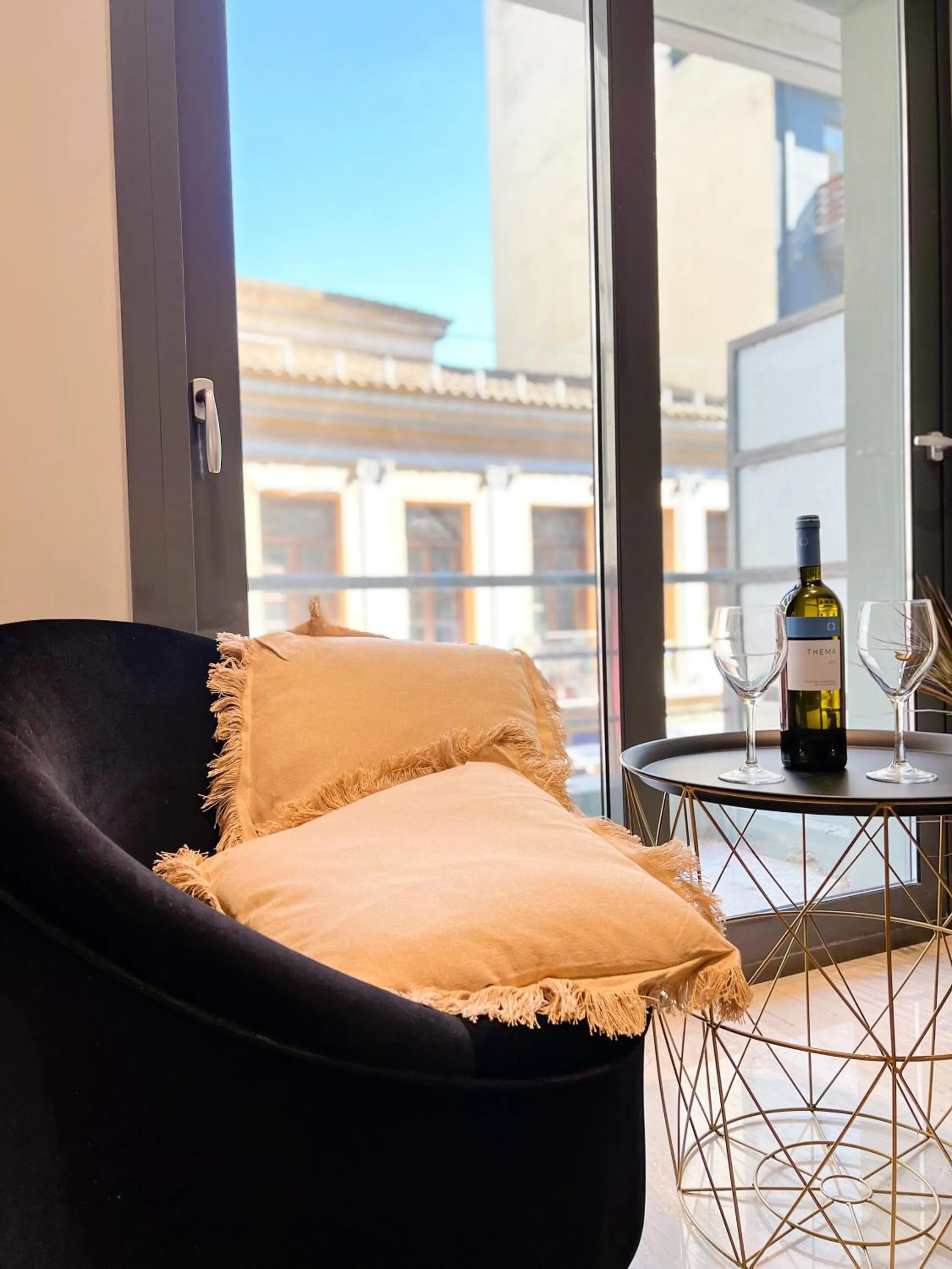 Seating area in Royalty Suites Psyrri