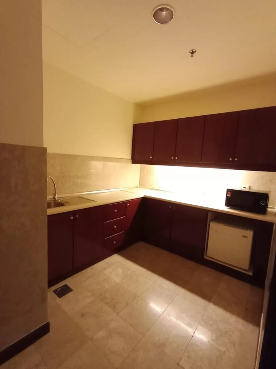 Kitchen or kitchenette in Kl landmark apartment at berjay Times square