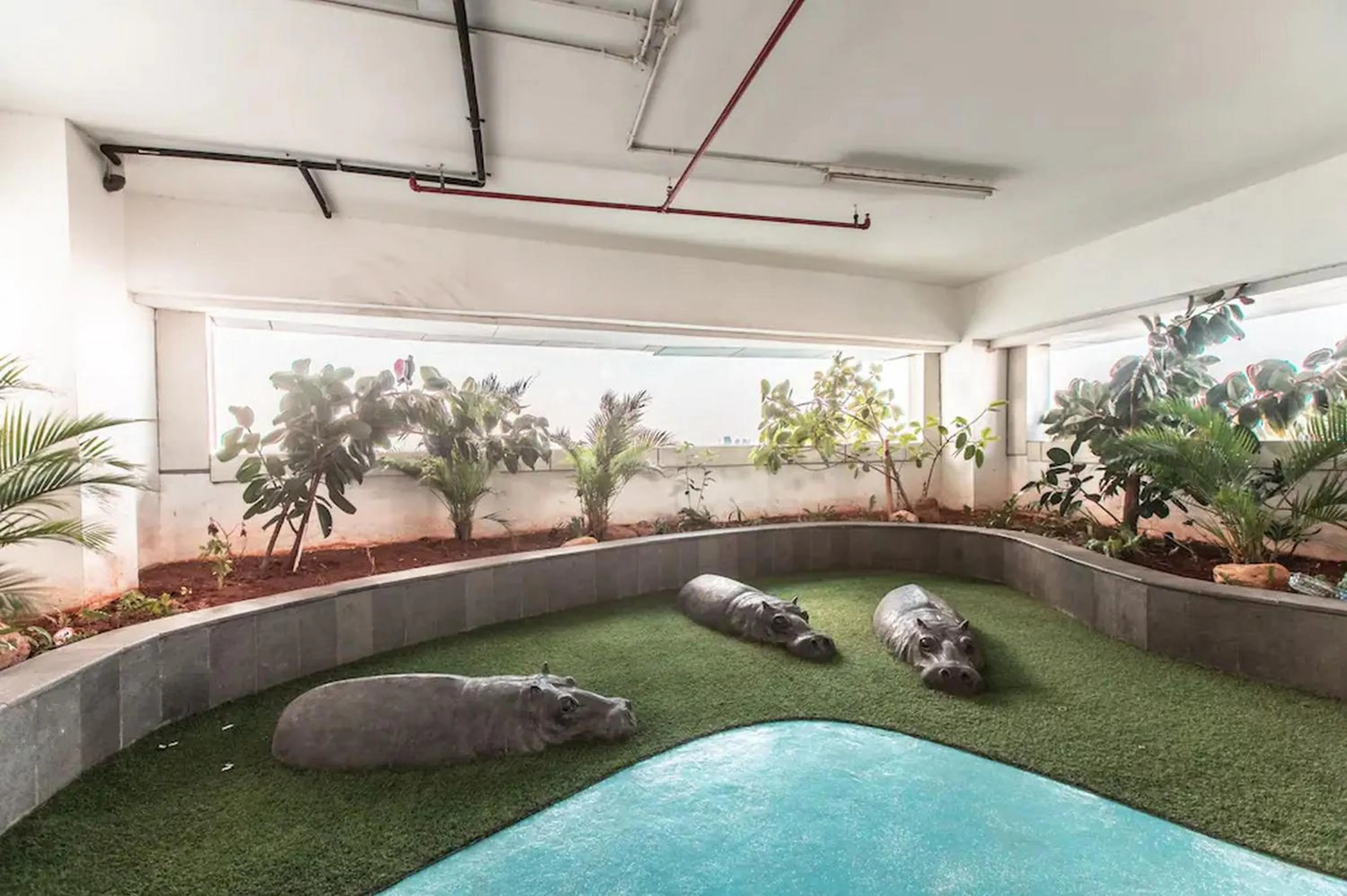 Garden in RedLiving Apartemen Grand Kamala Lagoon - Pekayon Tower Barclay North