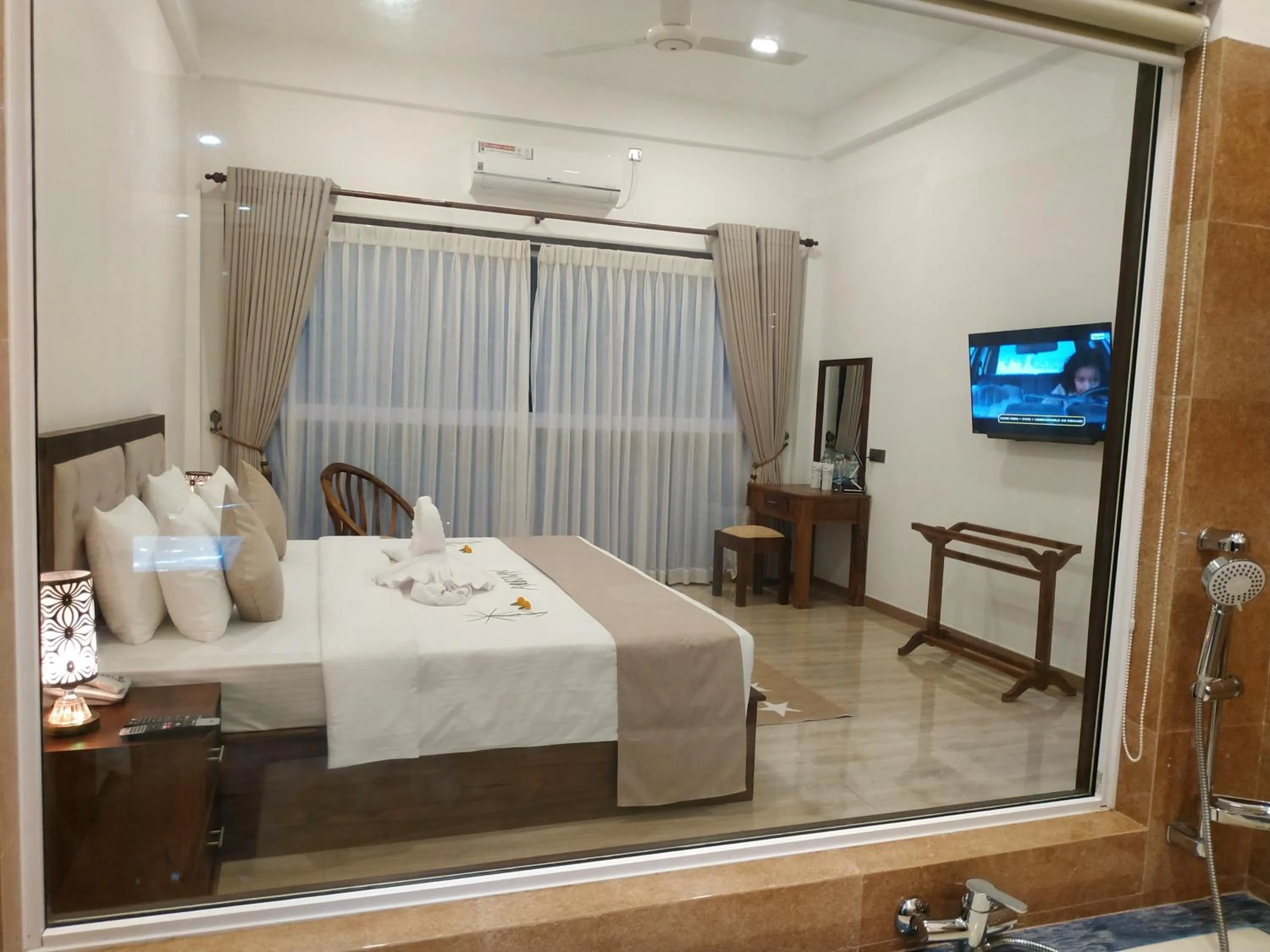 Bed in Sigiriya Cashew Palace Resort