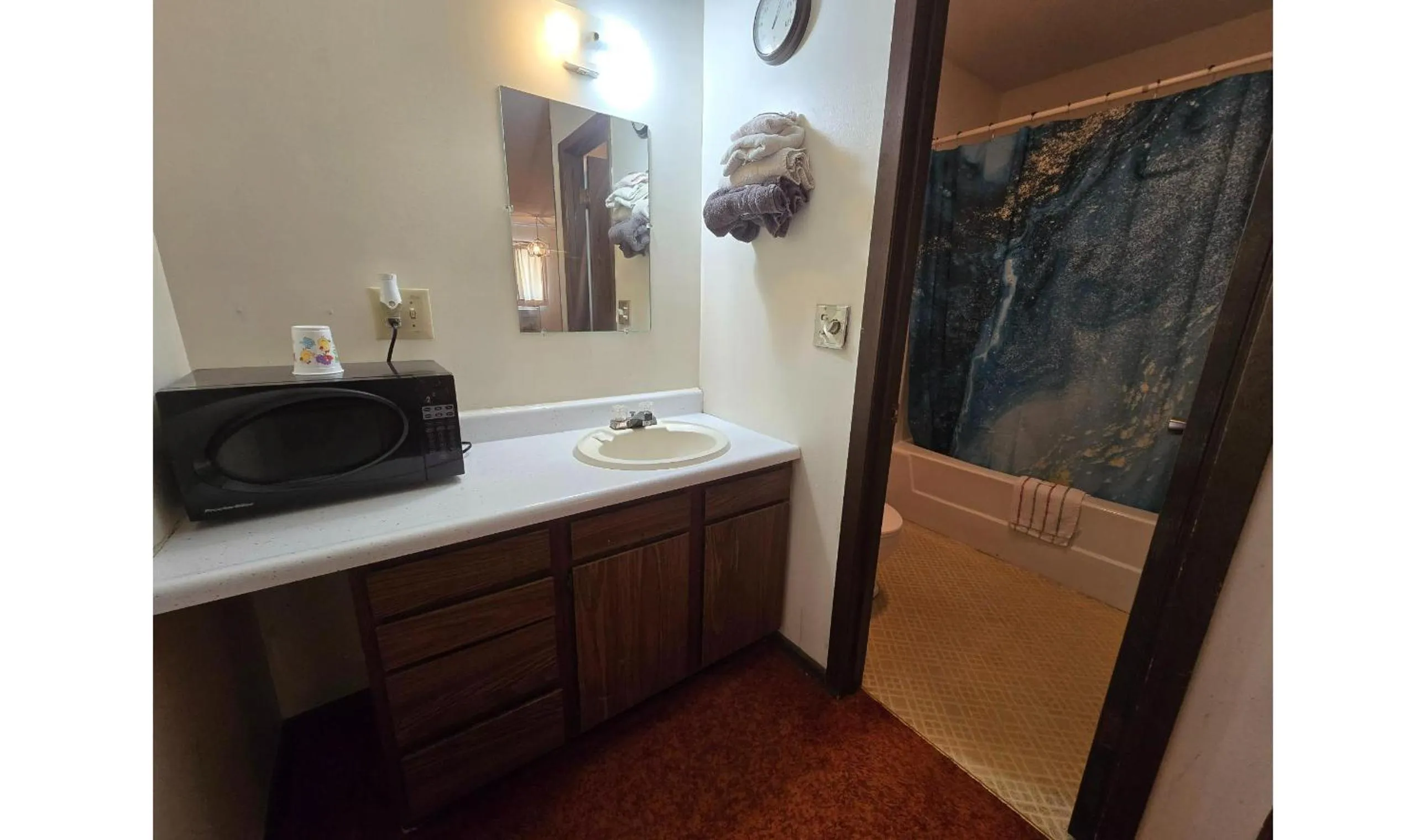 Bathroom in OYO Sandman Inn