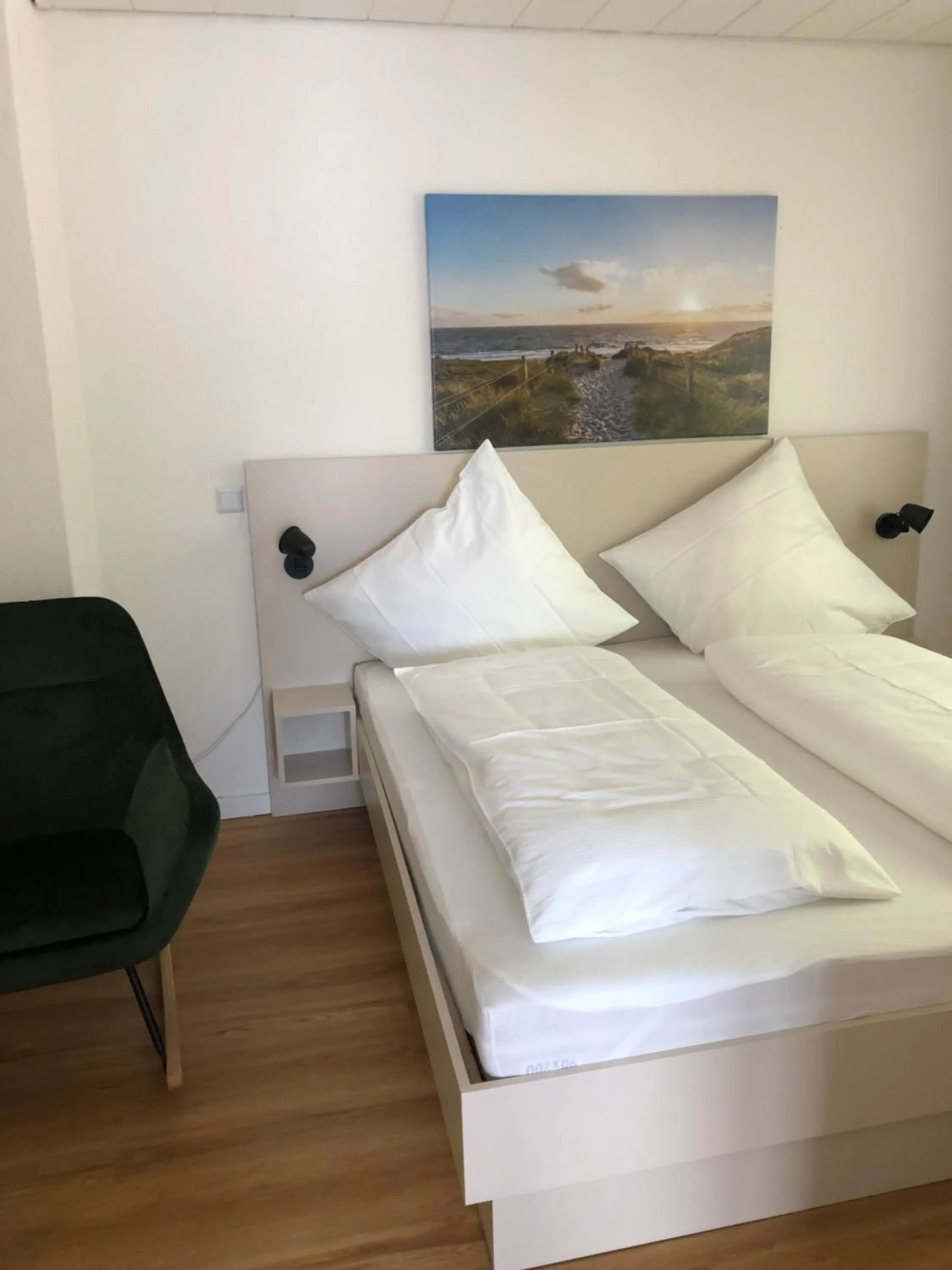 Bed in pension-seegarten