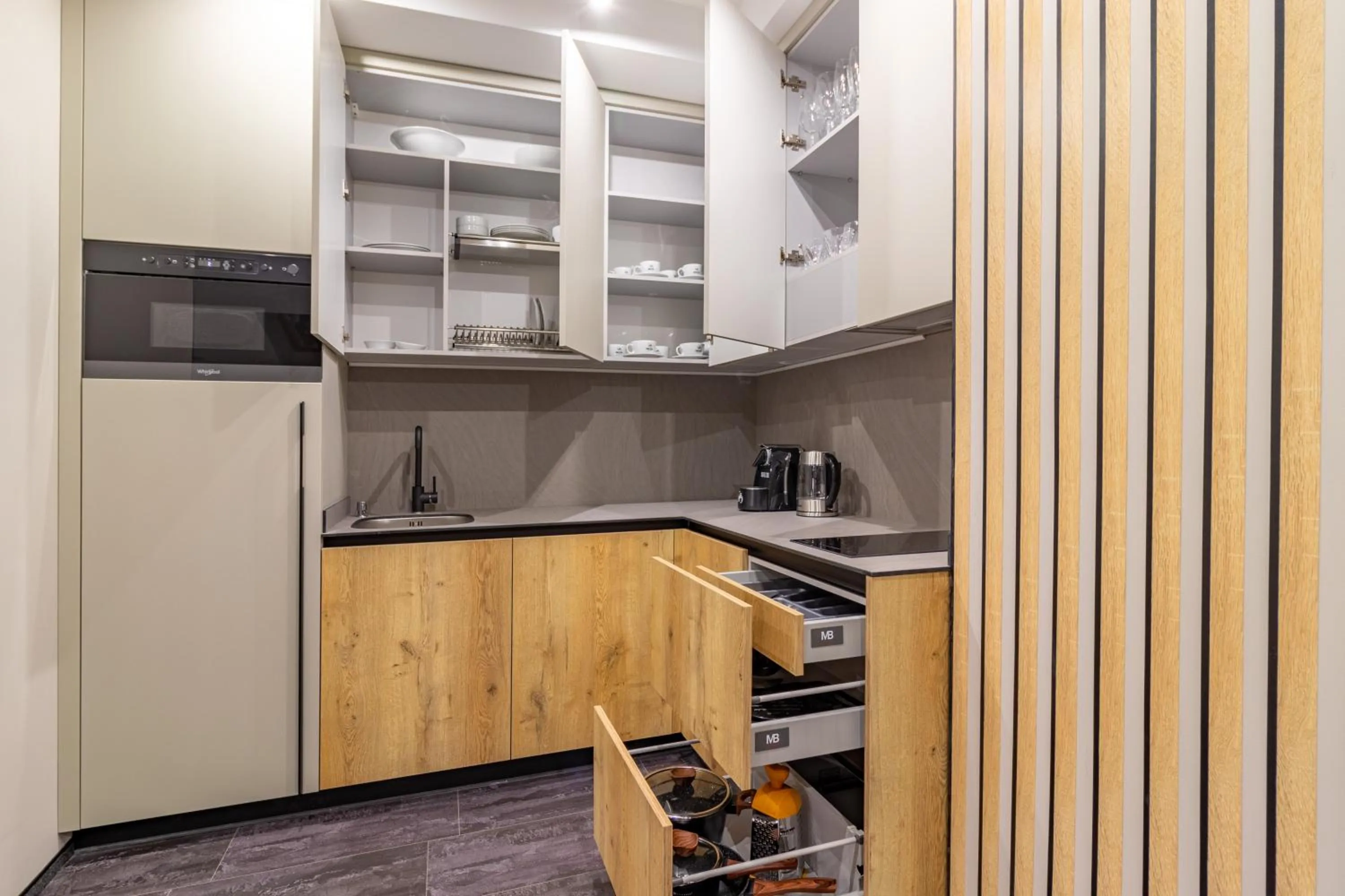 Kitchen or kitchenette in Shelter Apart Hotel