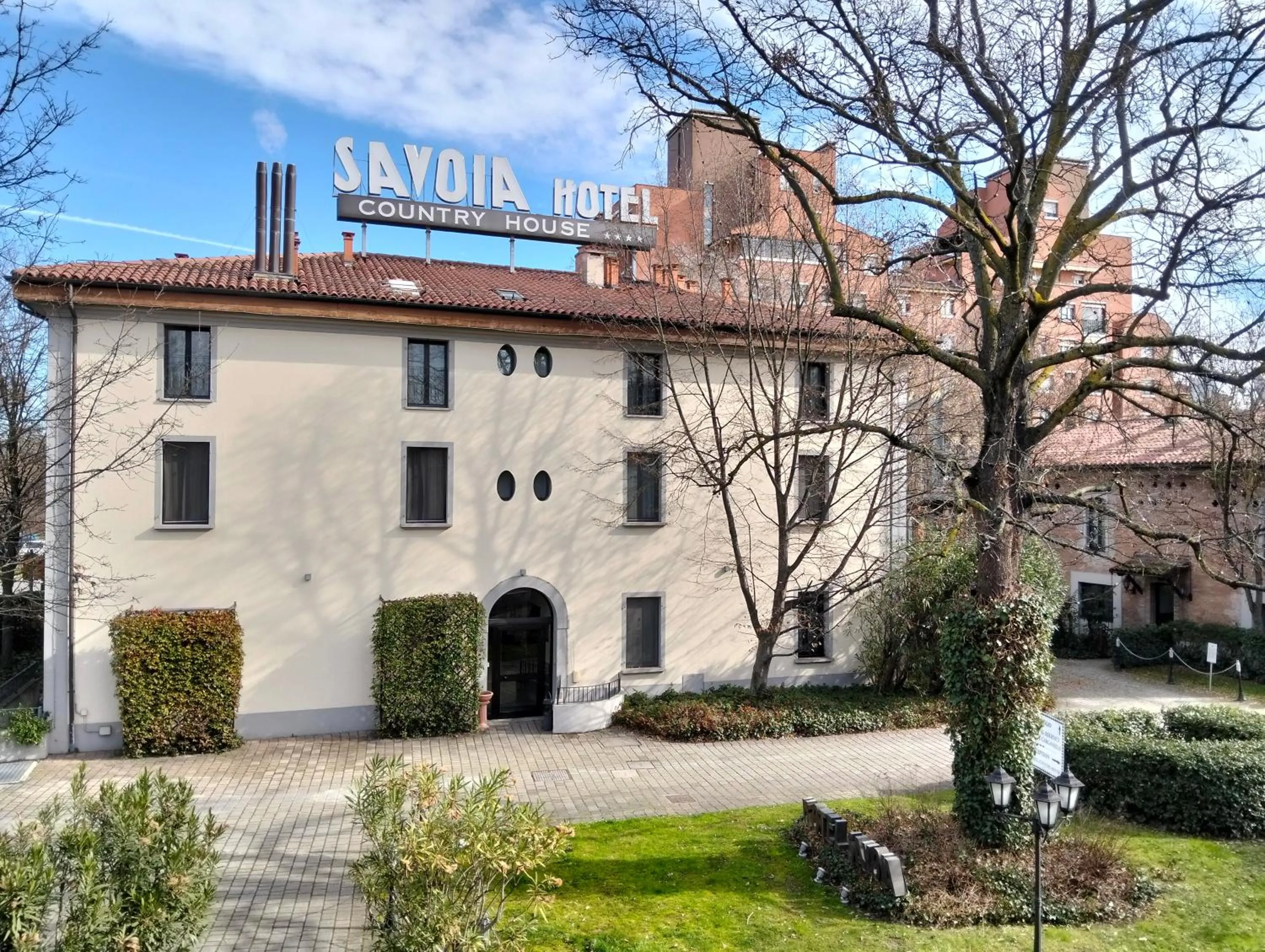 Property building in Savoia Hotel Country House Bologna