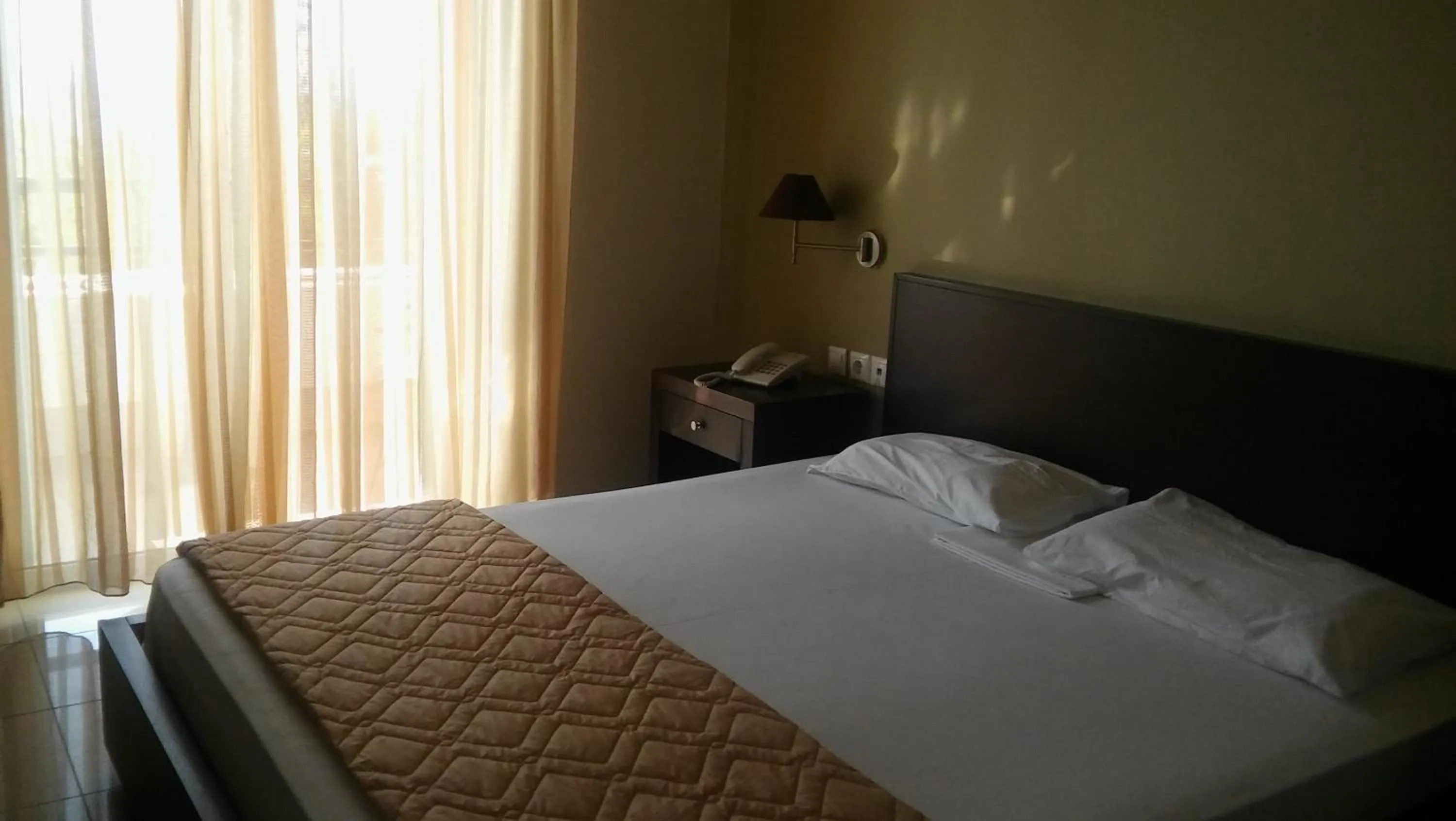 Bed in Tokalis Boutique Hotel & Spa