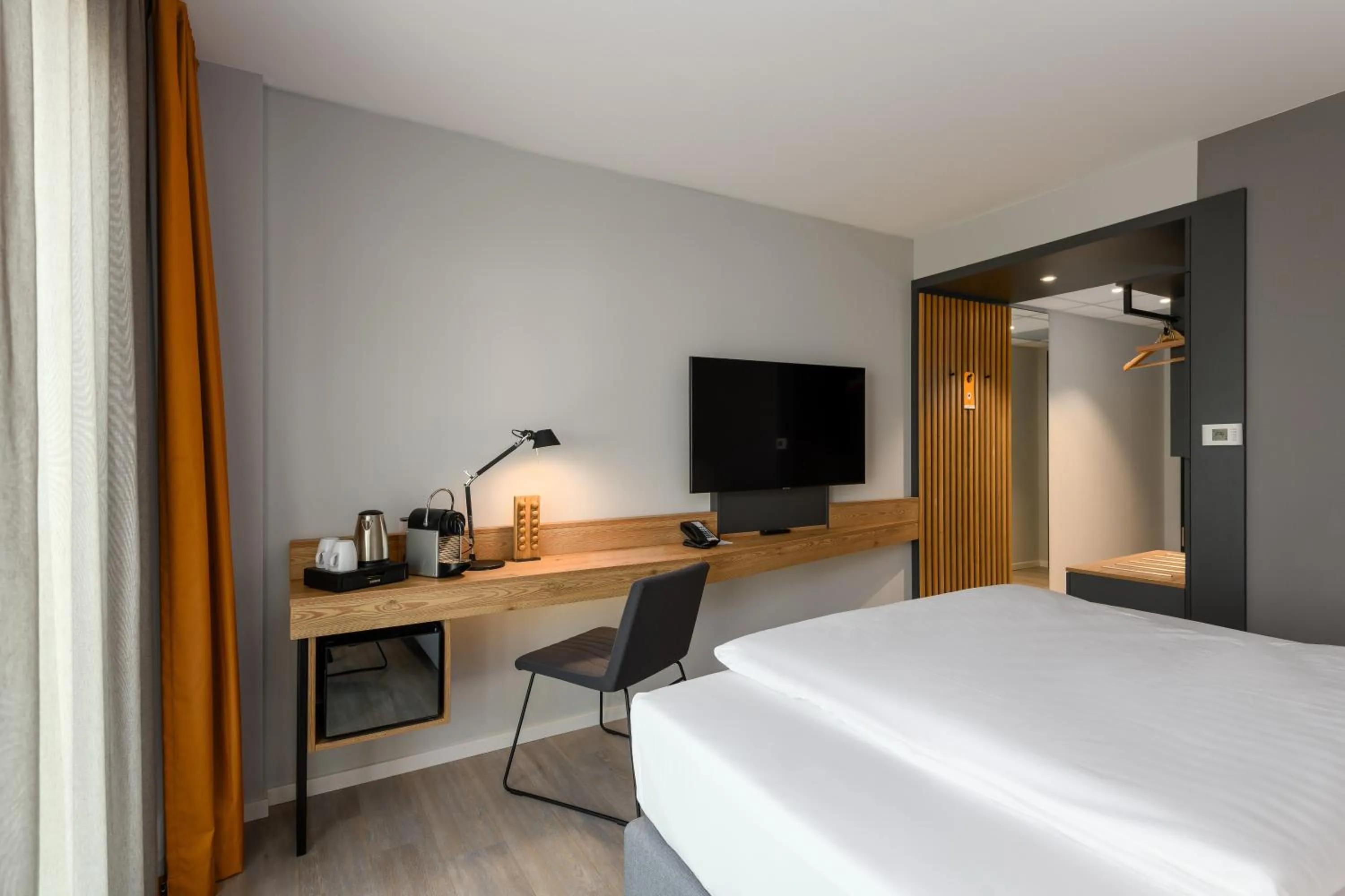TV and multimedia, Bed in Maxx Hotel Aalen
